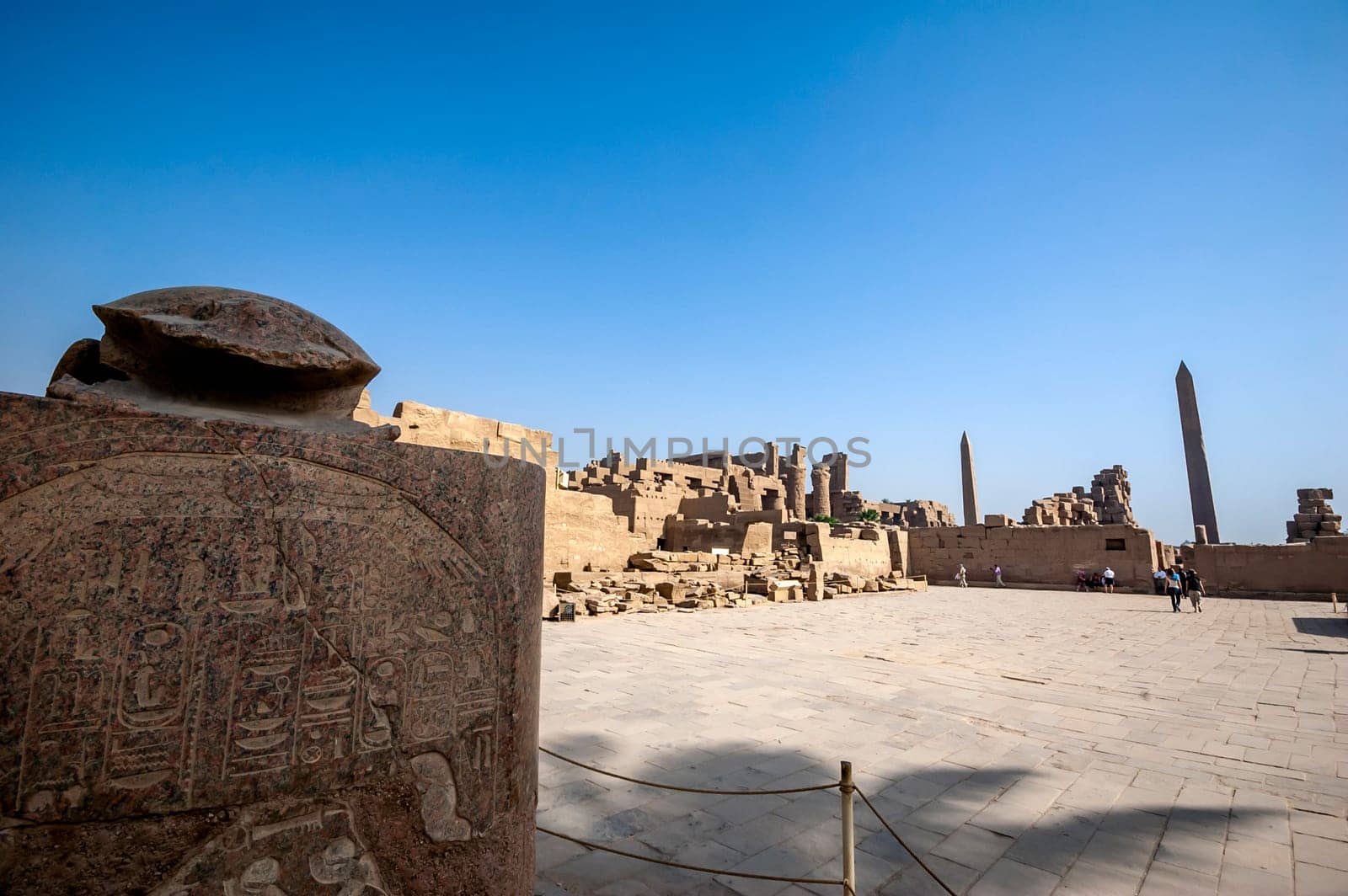 Tourists visiting the Temple of Amun by Giamplume