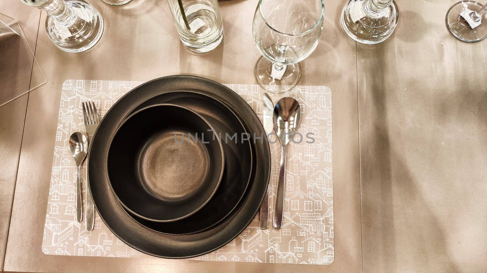 Empty plates and mugs on table. Beautiful table setting. Top view and background