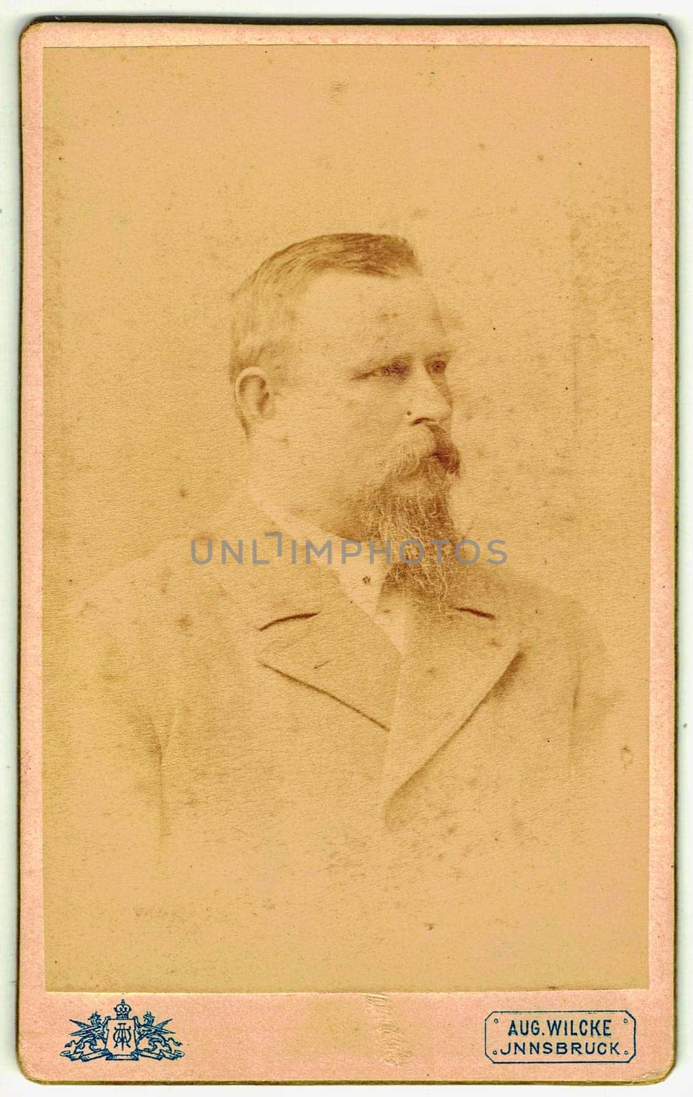 Vintage cabinet card shows portrait of elderly man. Edwardian hairstyle and fashion. Photo was taken in a photo studio. Photo was taken in Austro-Hungarian Empire or also Austro-Hungarian Monarchy by roman_nerud