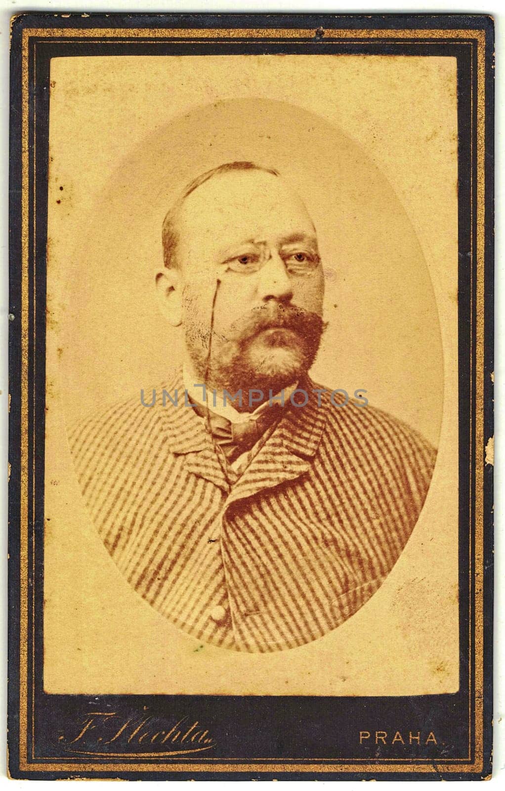 Vintage cabinet card shows portrait of elderly man. Edwardian fashion. Photo was taken in a photo studio. Photo was taken in Austro-Hungarian Empire or also Austro-Hungarian Monarchy by roman_nerud
