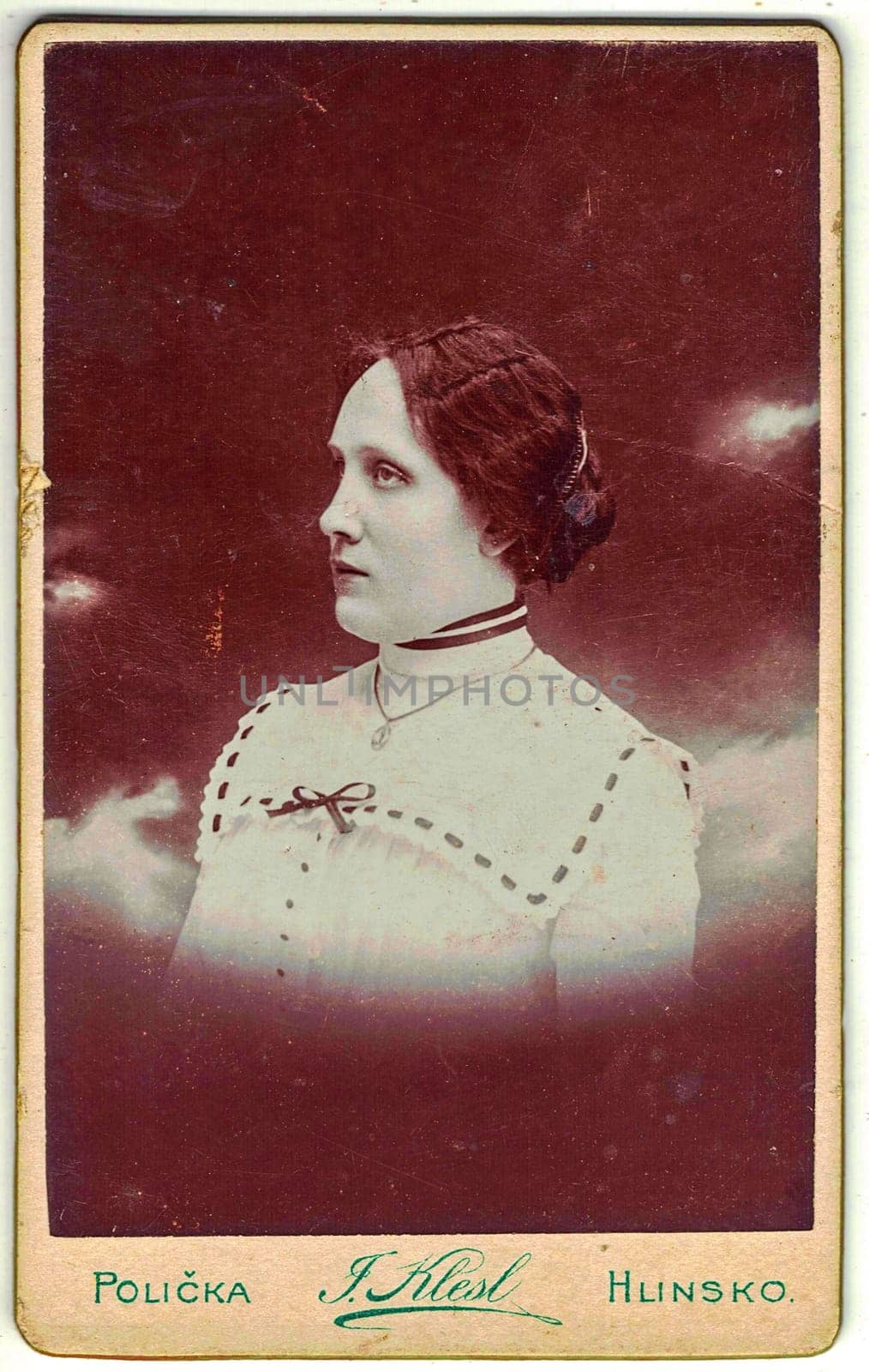 POLICKA, CZECHOSLOVAKIA - CIRCA 1920: Vintage cabinet card shows portrait of the middle-aged woman. Photo was taken in a photo studio.
