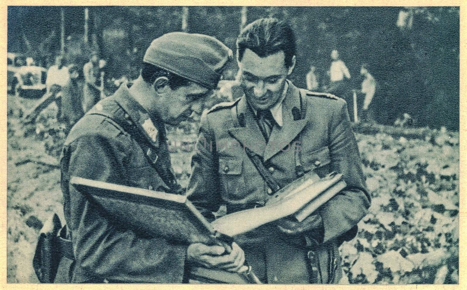 HUNGARY - 1941: Hungarian and Romanian officers have a conversation. World War 2. Axis - Tripartite Pact and states that adhered to the Tripartite Pact.