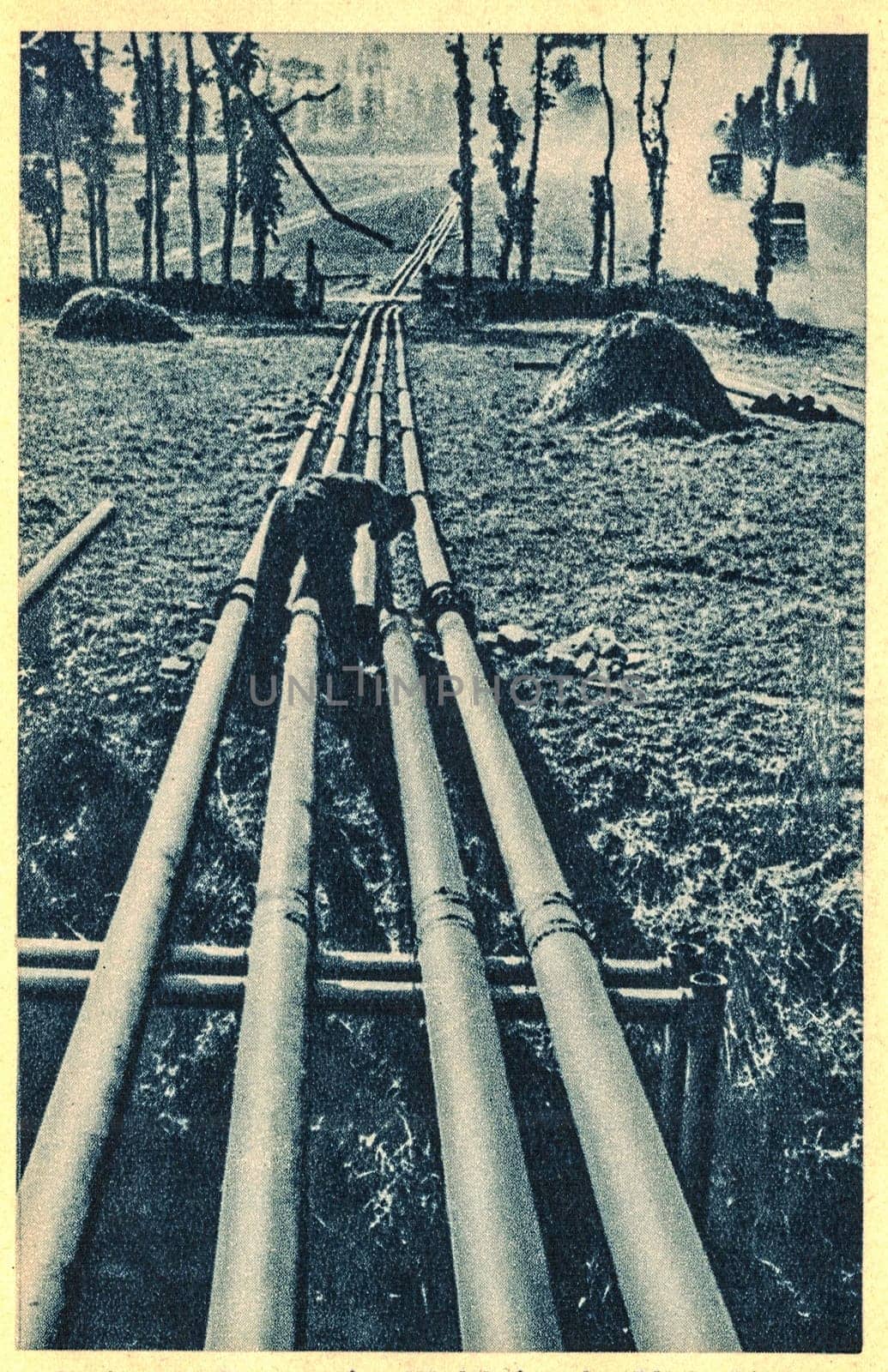 ENGLAND - CIRCA 1944: Fuel pipes for war troops. The Petroleum Warfare Department (PWD) was an organisation established in Britain in 1940 in response to the invasion crisis during World War II, when it appeared that Germany would invade the country.