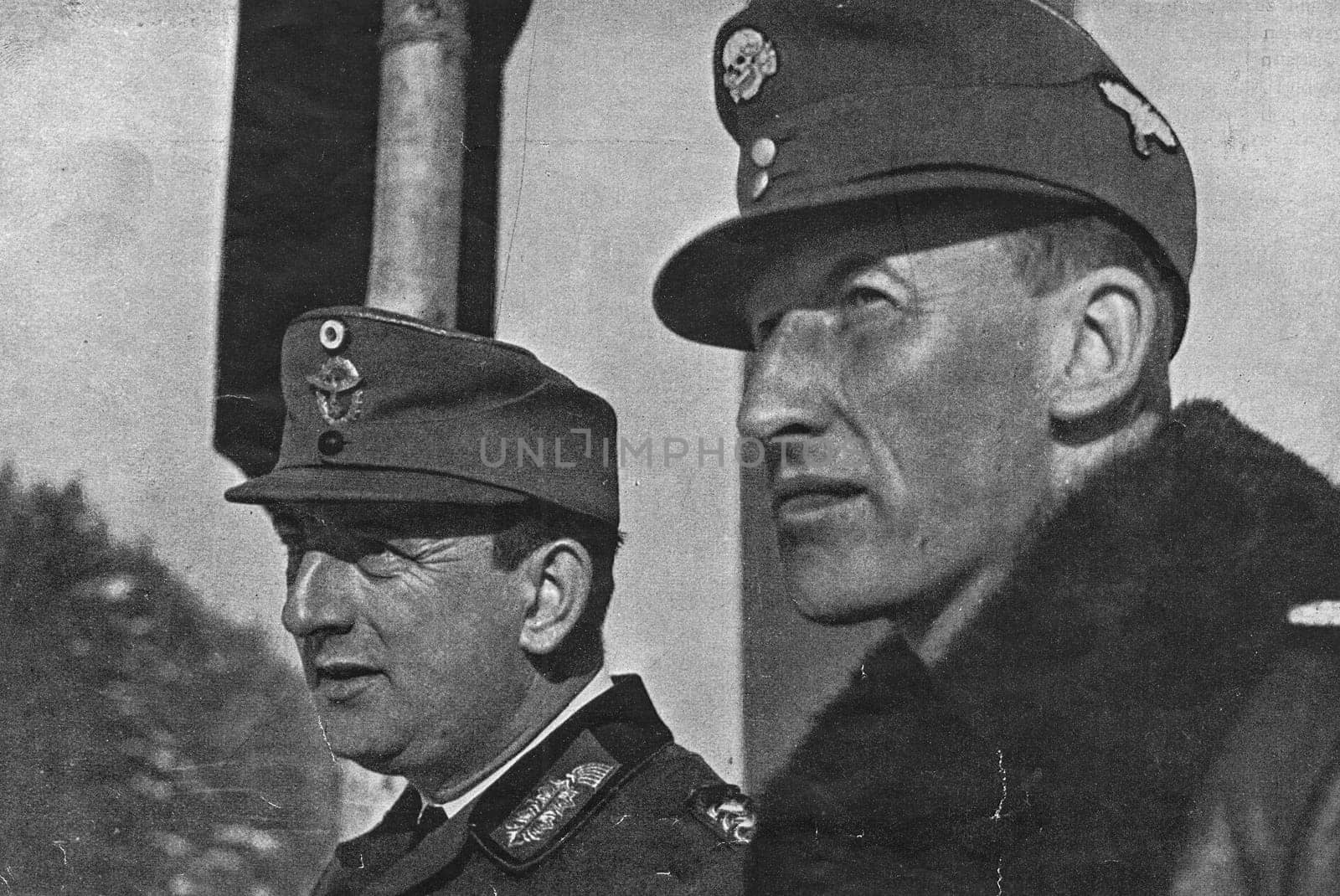 In the photo Kurt Daluege and Reinhard Heydrich. Daluege following Reinhard Heydrich's assassination in 1942, he served as Deputy Protector for the Protectorate of Bohemia and Moravia. Daluege directed the German measures of retribution for the assassination, including the Lidice massacre. After the end of World War II, he was extradited to Czechoslovakia, tried, convicted and executed in 1946. by roman_nerud