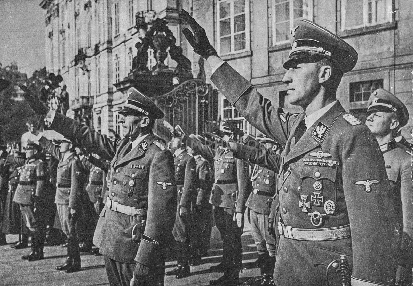 PRAGUE, PROTECTORATE OF BOHEMIA AND MORAVIA - SEPTEMBER 28, 1941: Reinhard Heydrich (right) and K.H. Frank at Prague castle. Nazis salute.