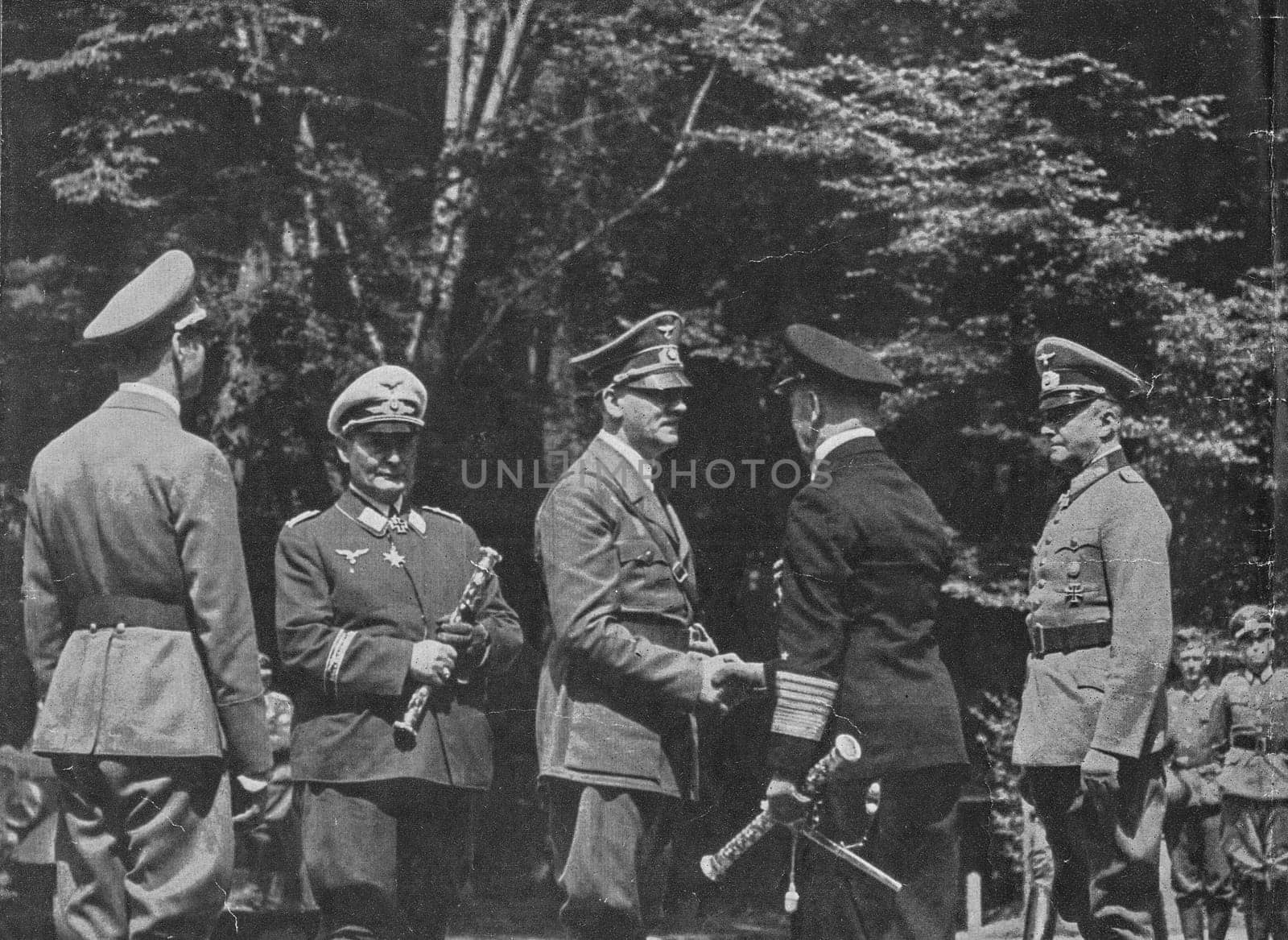 COMPIEGNE, FRANCE - JUN 21, 1940: The meeting of fascist leaders before armistice with Francein Compiegne. From left to right: Deputy Fuhrer Rudlof Hess, Reichsmarschall Hermann Goring, Adolf Hitler, Admiral Erich Raeder and Field Marshal Walter von Brauchitsch.
