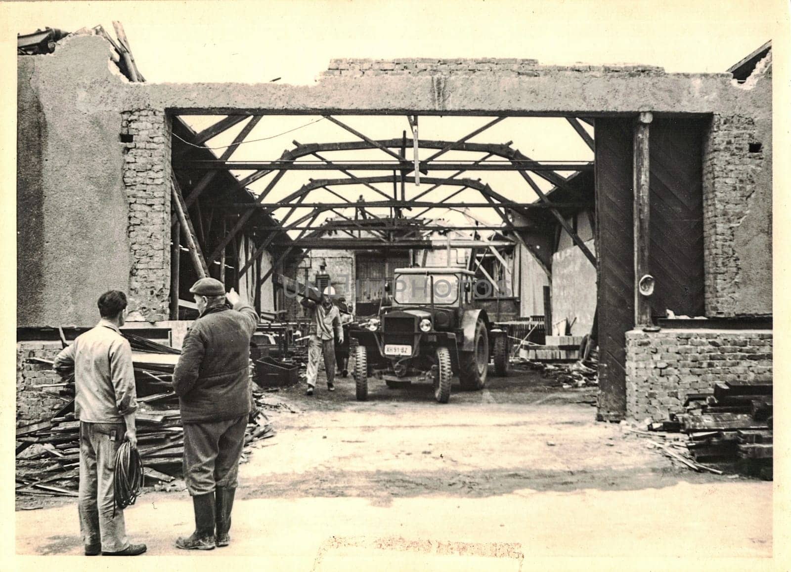 FRAUREUTH, EAST GERMANY - MAY 7, 1965: The retro photo shows construction site in Socialist bloc. Former East Germany, 1960s.