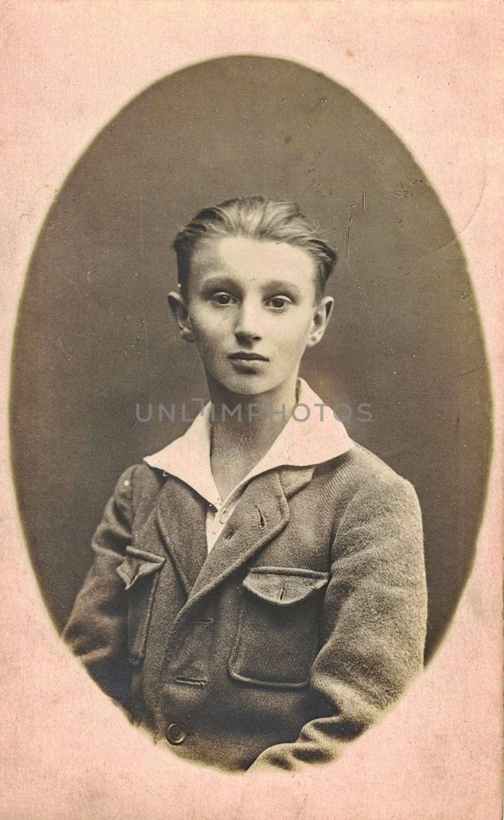 Vintage photo shows boy - teenager. Circa 13 year old. Studio black and white portrait by roman_nerud