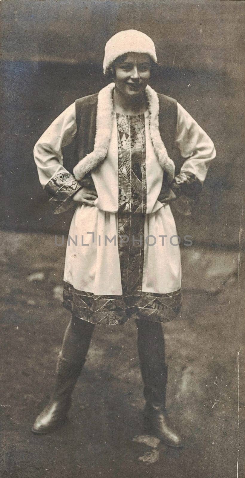 Vintage photo shows young girl wears traditional folk costum - ladies suit. Black and white photography. German tradition. by roman_nerud
