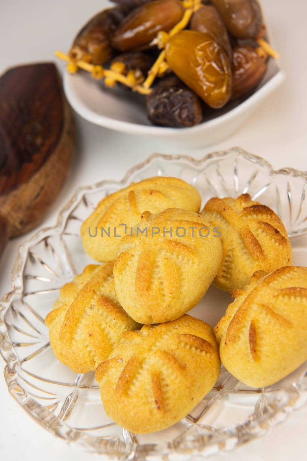 Traditional eid maamoul or mamoul cookies with dates, nuts, and jam, Arabic sweets for Aid al-Fitr and easter, High quality photo