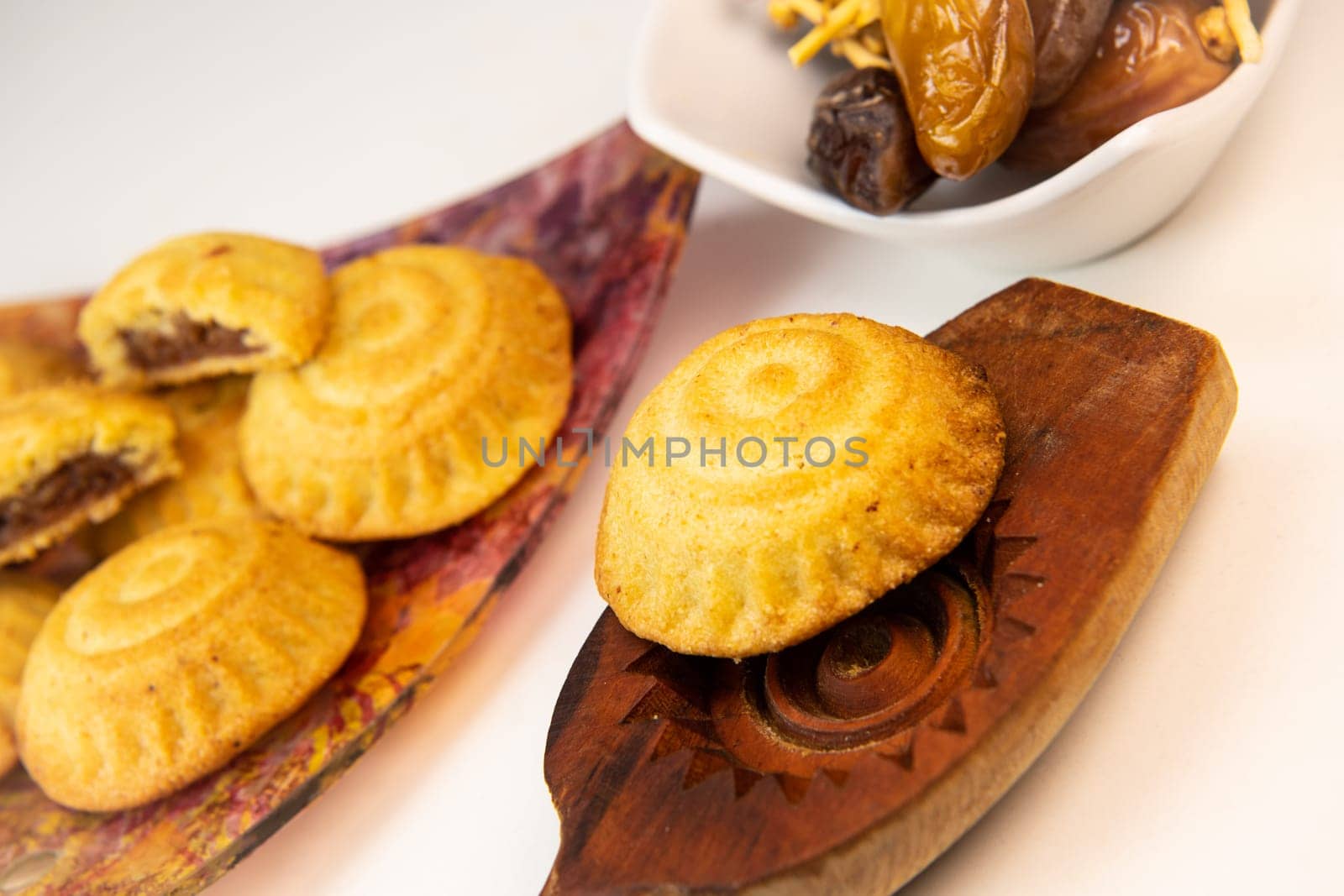 Traditional eid maamoul or mamoul cookies with dates, nuts, and jam, Arabic sweets for Aid al-Fitr and easter, High quality photo