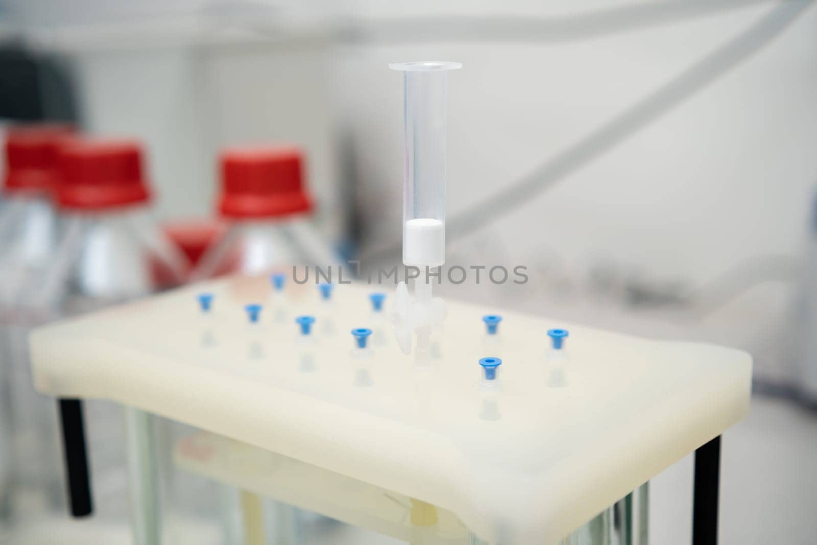 Vacuum Solid Phase extraction SPE manifold with catridge for sample preparation in chemical laboratory.