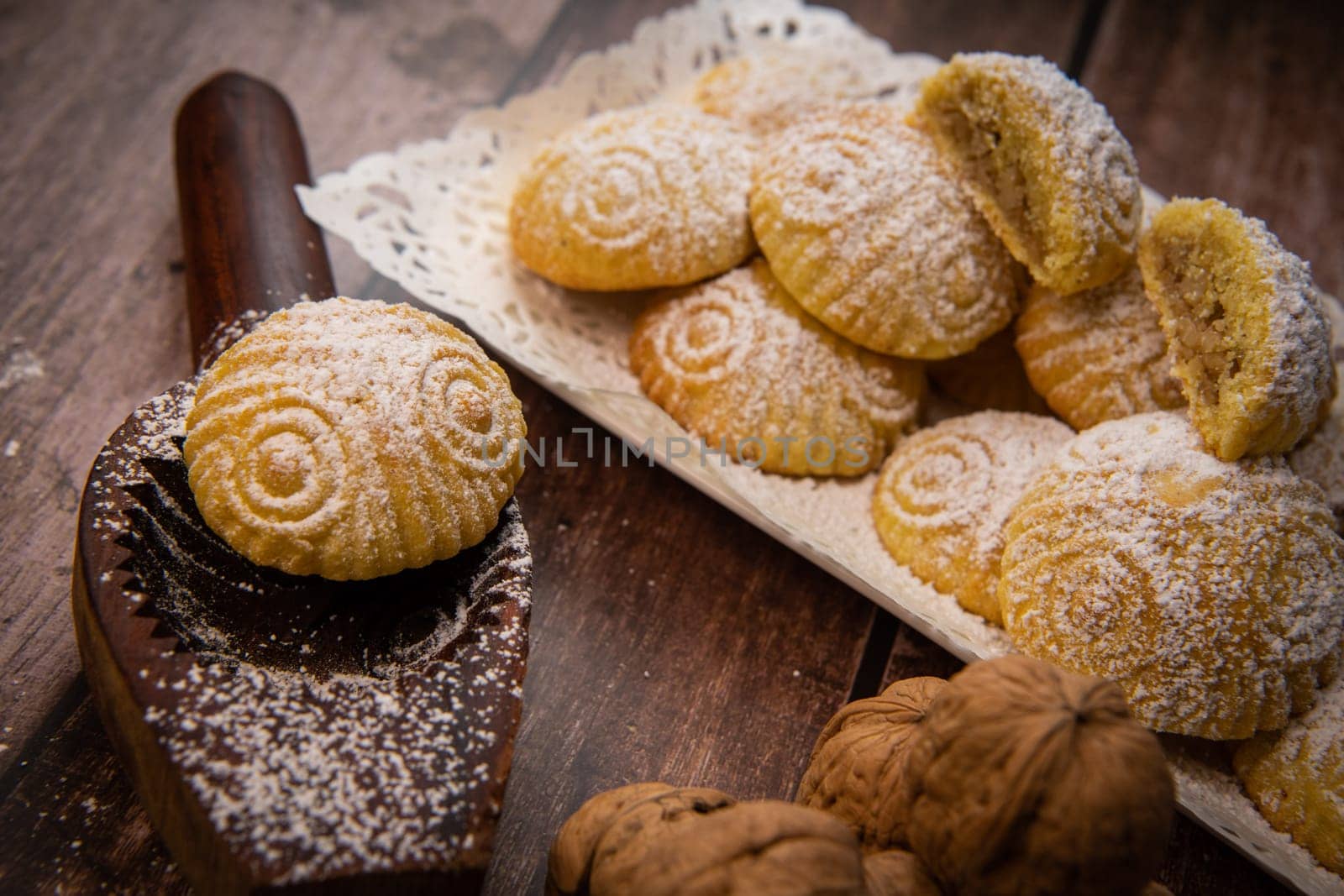 Traditional eid maamoul or mamoul cookies with dates, nuts, and jam, Arabic sweets for Aid al-Fitr and easter, High quality photo