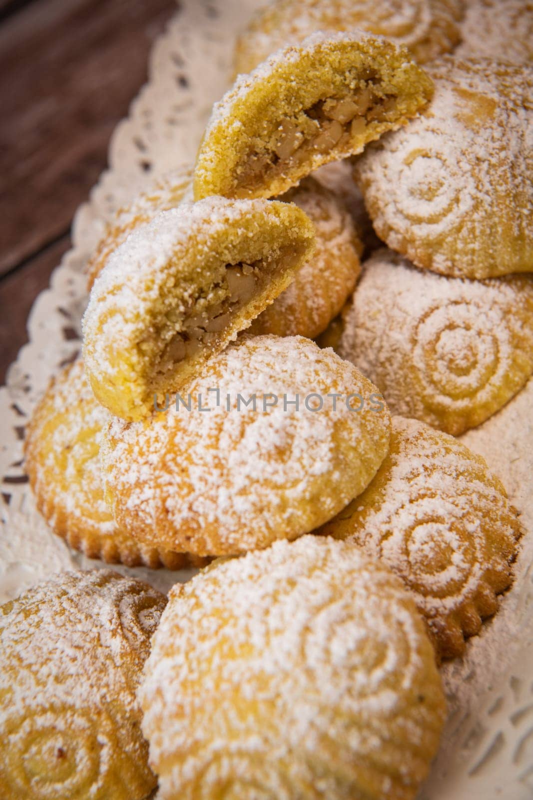 Traditional eid maamoul or mamoul cookies with dates, nuts, and jam, Arabic sweets for Aid al-Fitr and easter, High quality photo