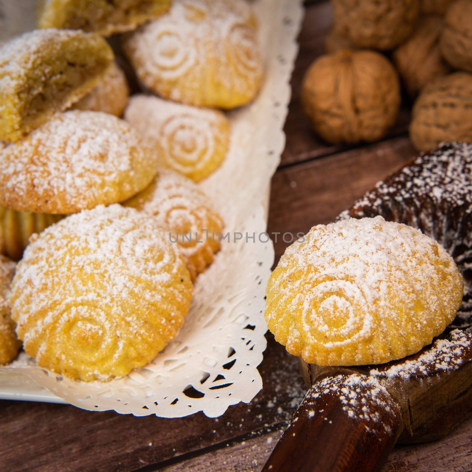 Traditional eid maamoul or mamoul cookies with dates, nuts, and jam, Arabic sweets for Aid al-Fitr and easter, High quality photo