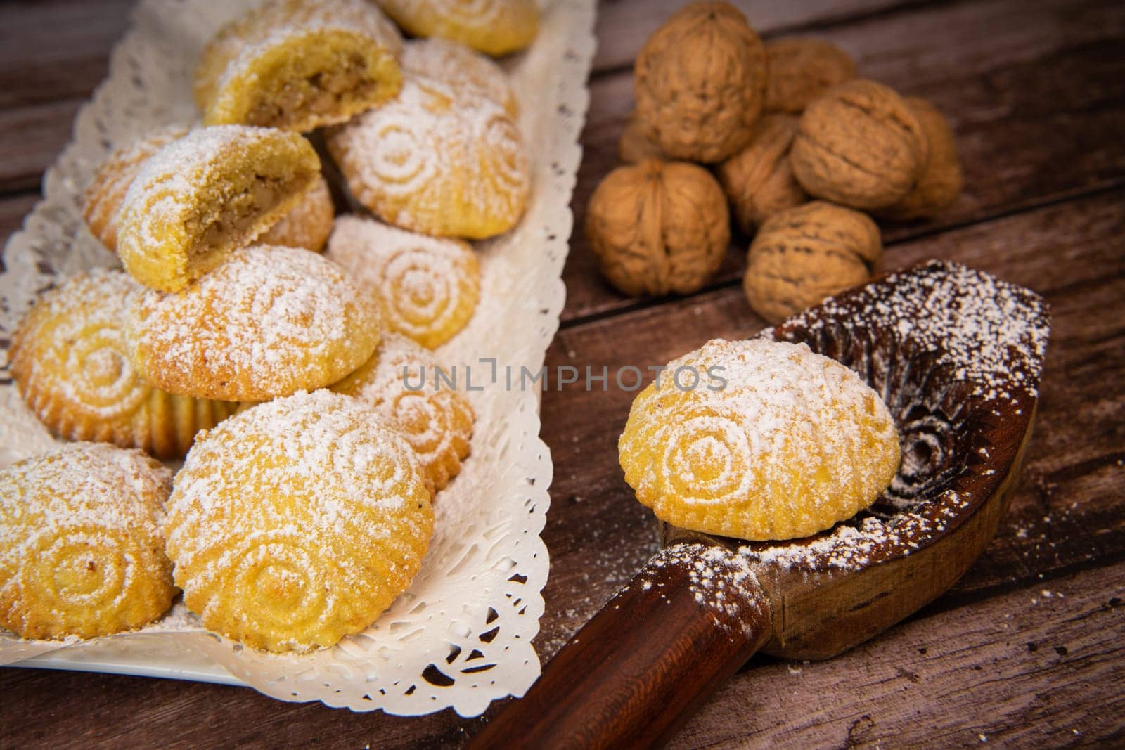 Traditional eid maamoul or mamoul cookies with dates, nuts, and jam, Arabic sweets for Aid al-Fitr and easter, High quality photo