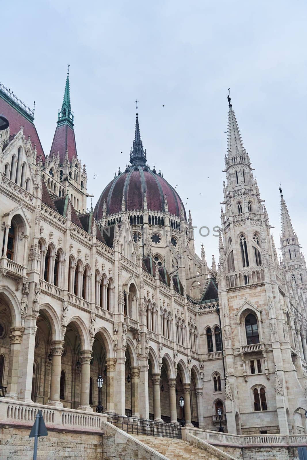 Hungarian Parliament Building in the evening at the Danube river in Budapest, Hungary. High quality photo