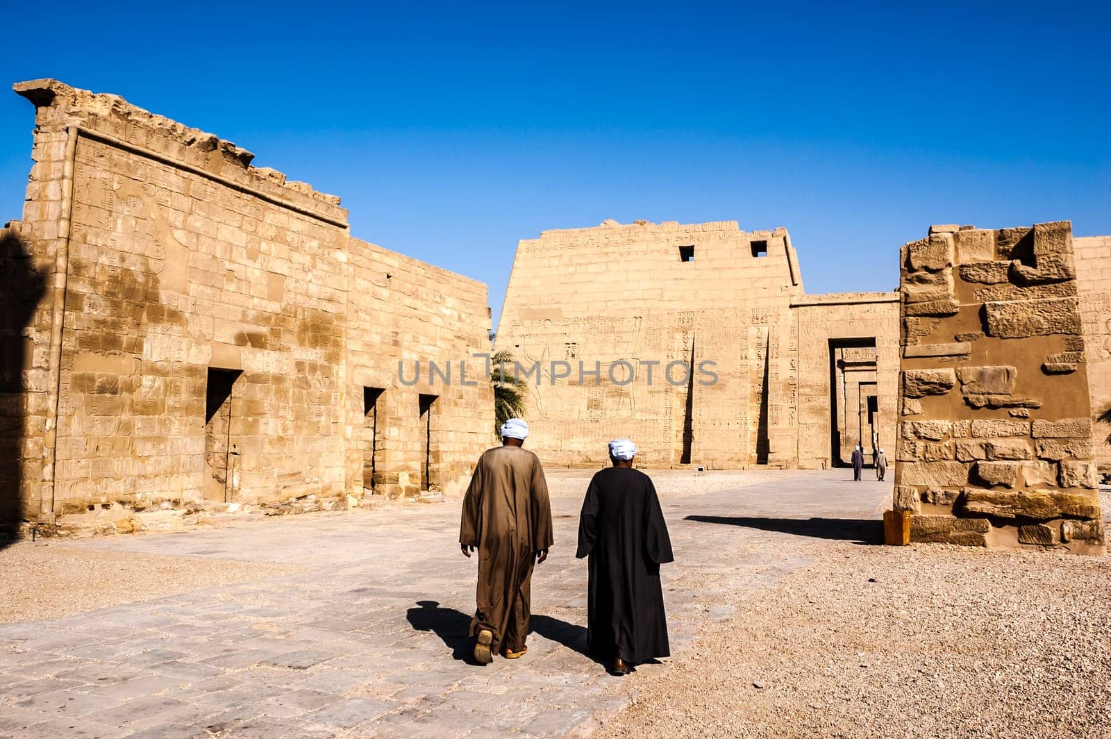 Luxor, Egypt - April 16 2008: The funerary temple of Ramses II in the archaeological site of Medinet Habu, Luxor, Egypt