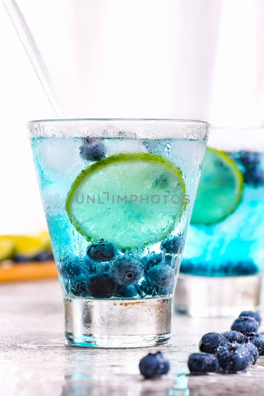 Blue Mojito with blueberries. Cocktails Liquor-based Blue Curacao
