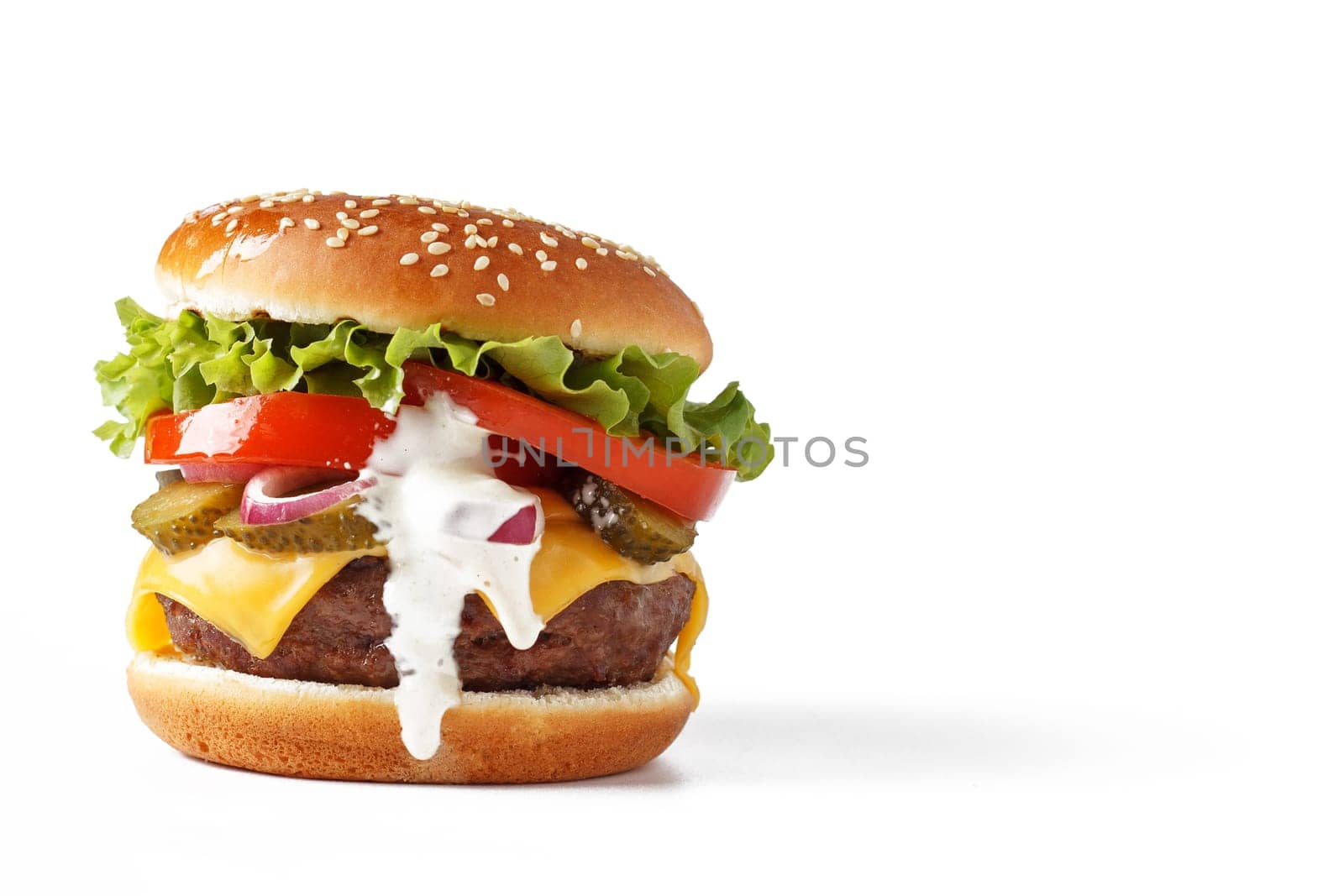 Classic cheeseburger isolated on white background. copy space by lara29