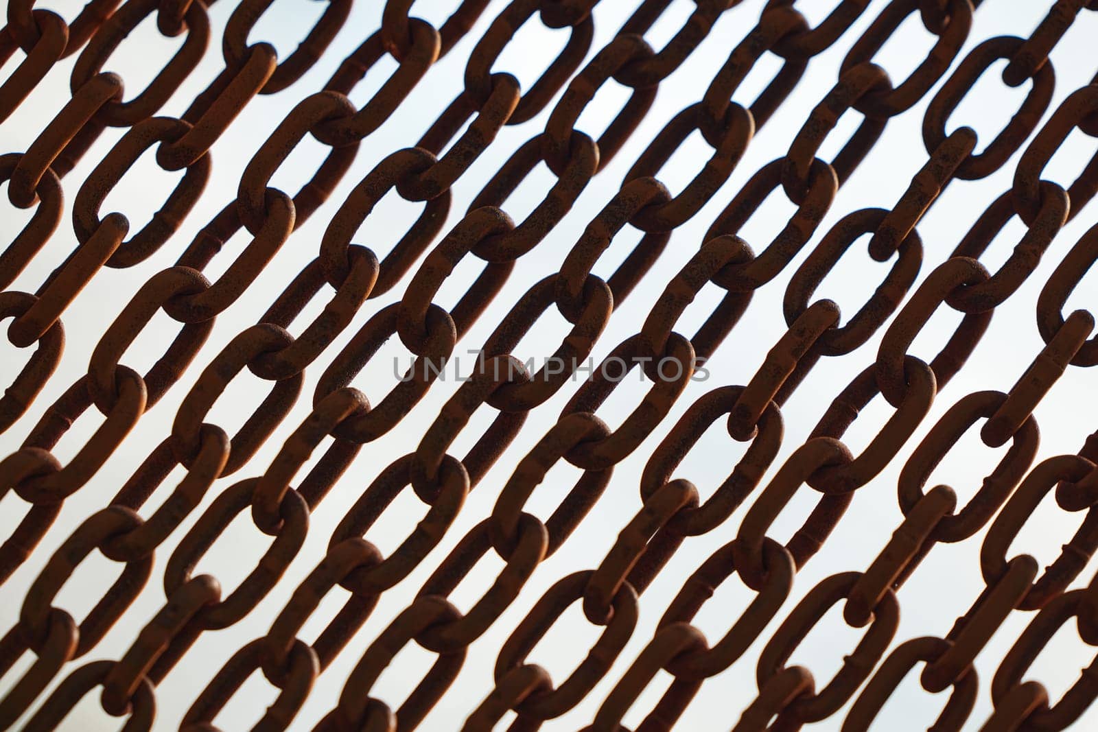 Rusty chains isolated on white. black and white concept. Background of chains on a withe background. Rust Anchor Chain. Curtain of old chain-link. Background of metal chains, old used chain.
