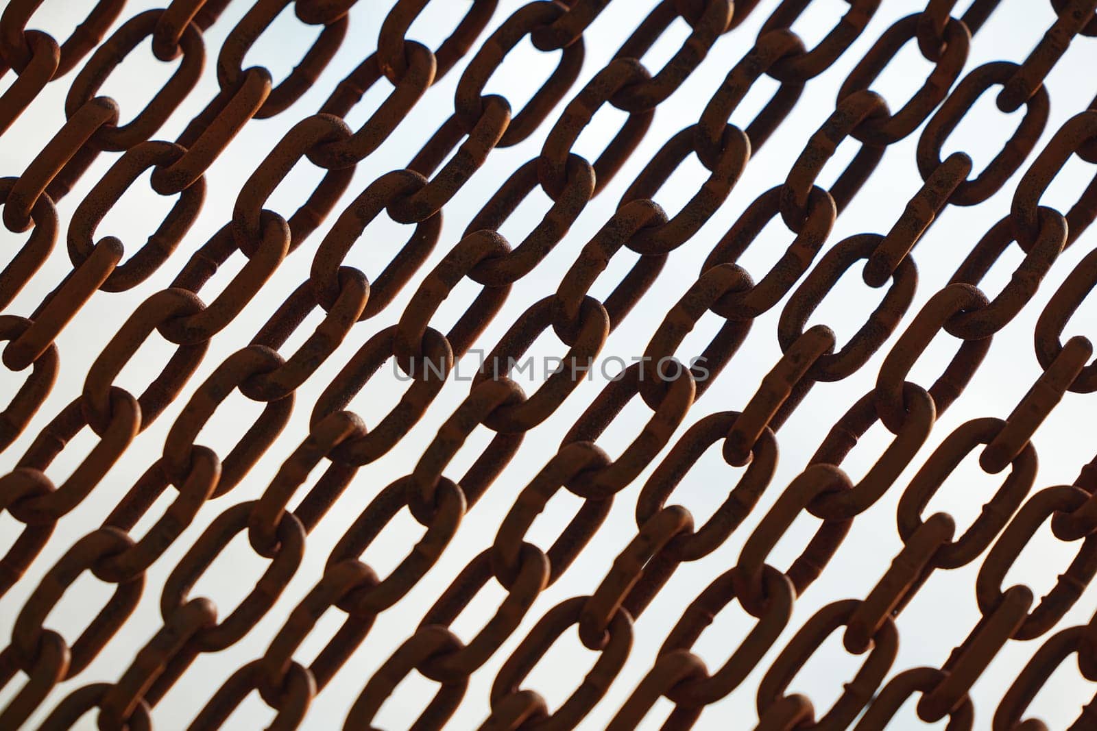 Rusty chains isolated on white. black and white concept. Background of chains on a withe background. Rust Anchor Chain. Curtain of old chain-link. Background of metal chains, old used chain.