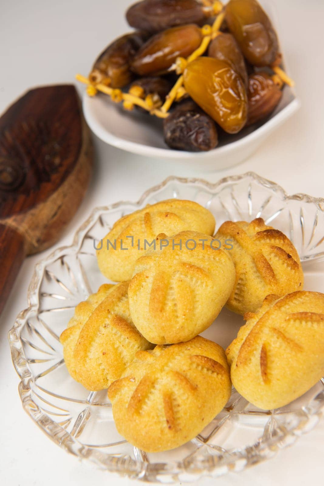 Traditional eid maamoul or mamoul cookies with dates, nuts, and jam, Arabic sweets for Aid al-Fitr and easter, High quality photo