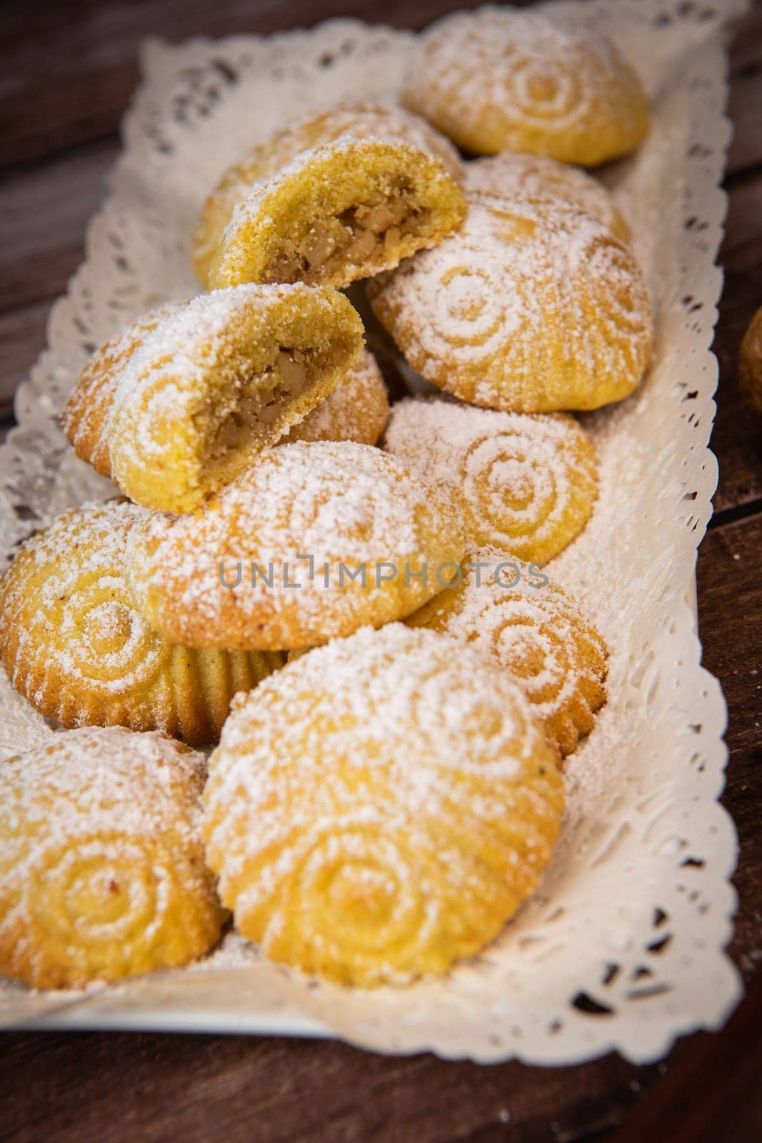Traditional eid maamoul or mamoul cookies with dates, nuts, and jam, Arabic sweets for Aid al-Fitr and easter, High quality photo