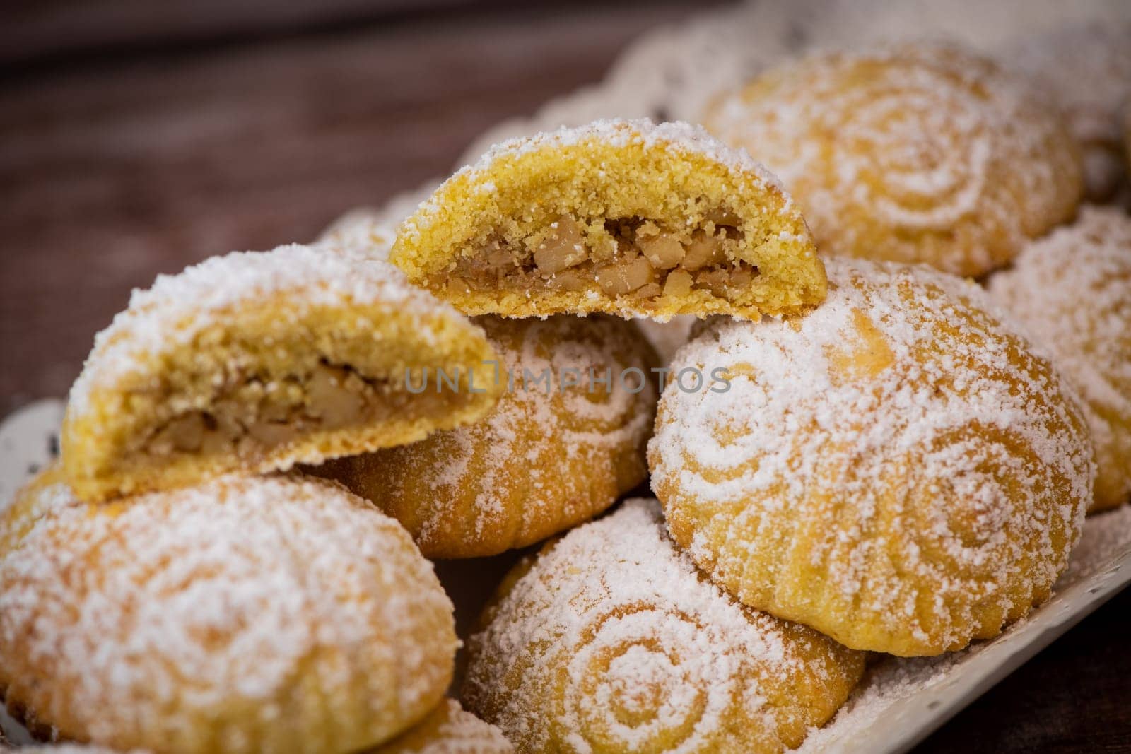 Traditional eid maamoul or mamoul cookies with dates, nuts, and jam, Arabic sweets for Aid al-Fitr and easter, High quality photo