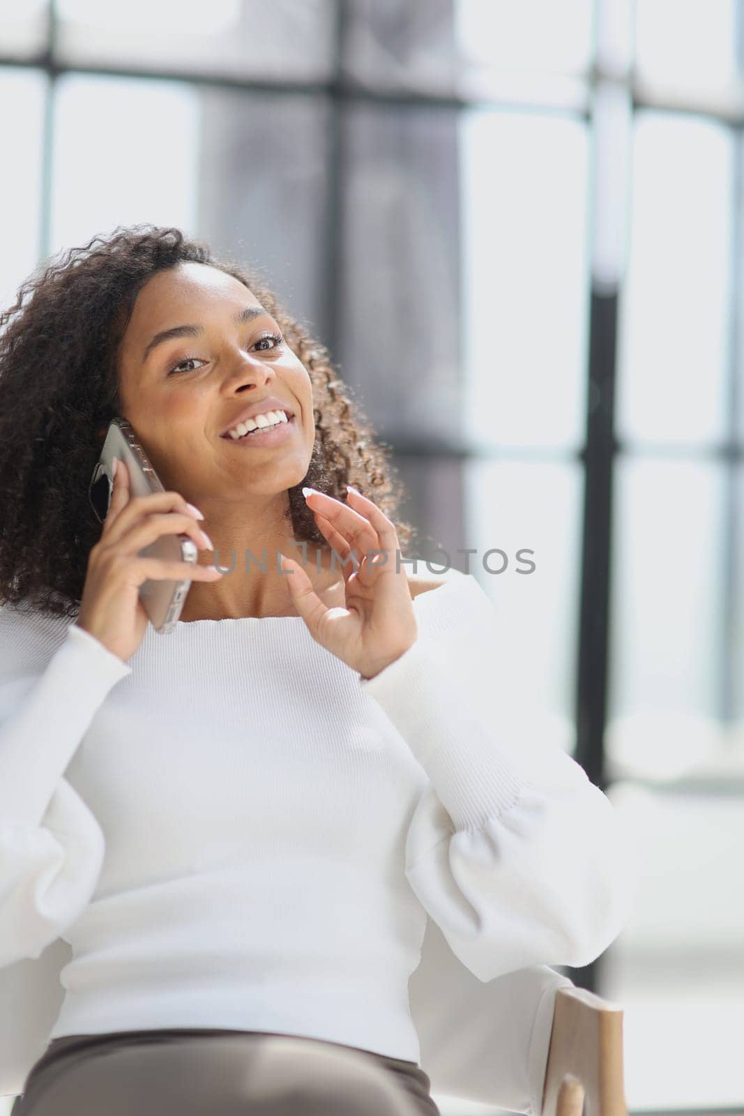 Portrait of a young African American woman using a smartphone