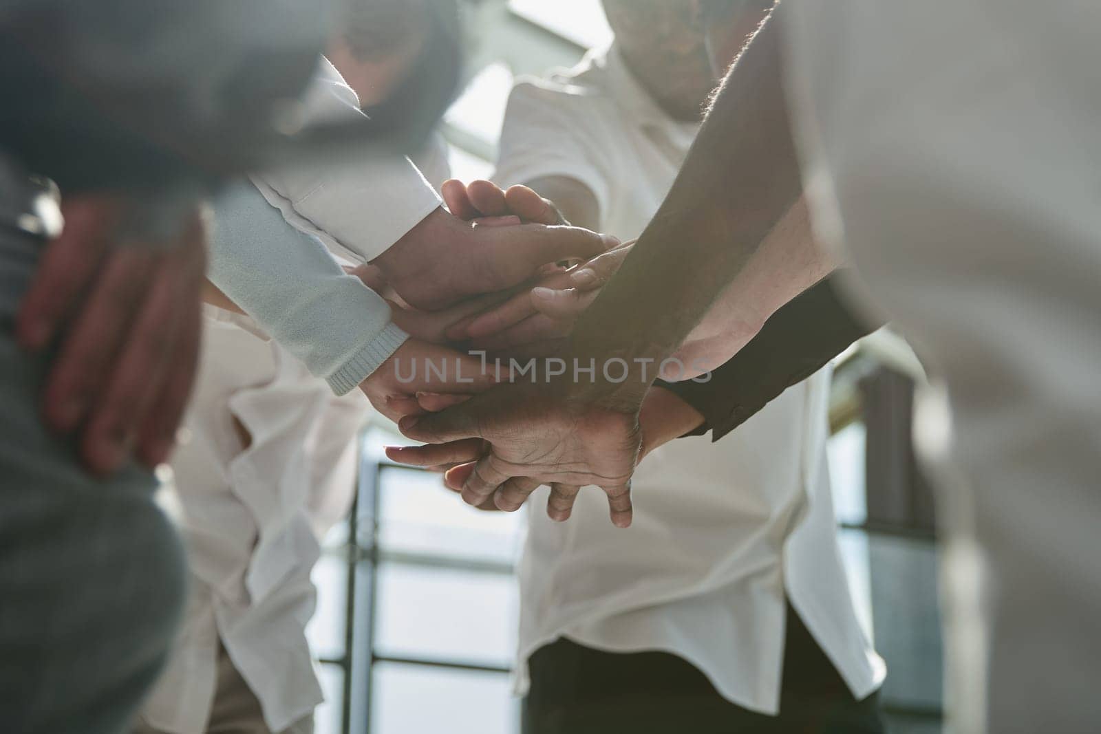 group of diverse young people standing in the office