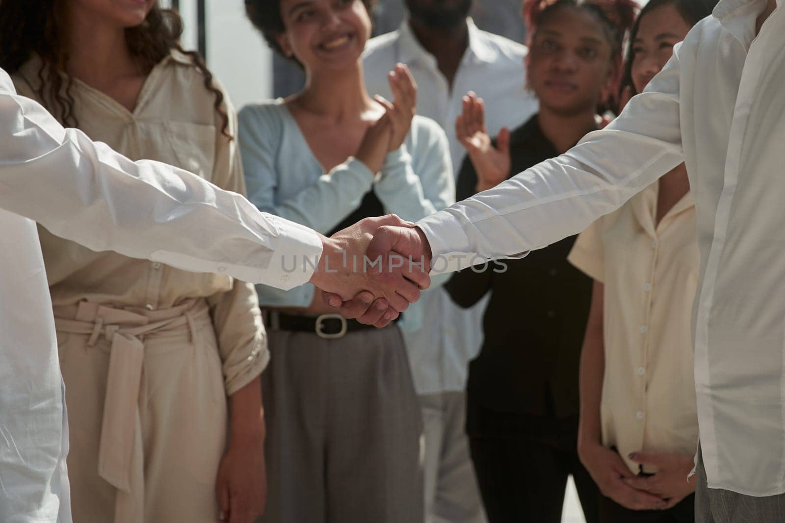 Business people shaking hands, finishing up a meeting