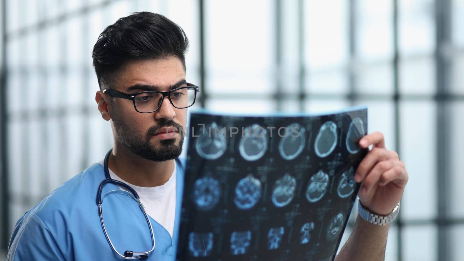 Brain disease diagnosis with medical doctor seeing Magnetic Resonance Imaging