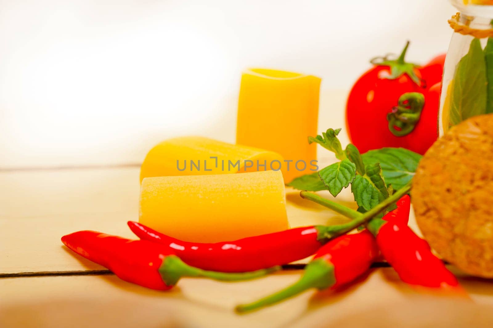 Italian pasta paccheri with tomato mint and chili pepper by keko64