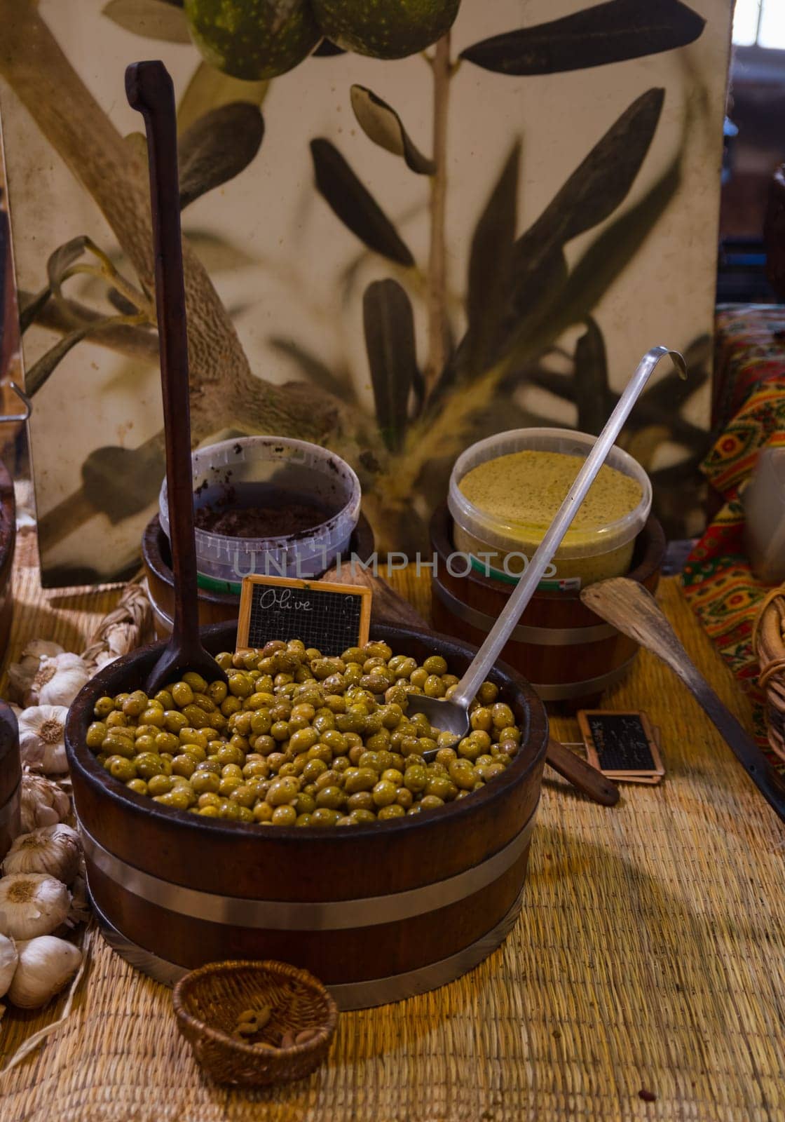 a bowl of olives on the market in France by compuinfoto