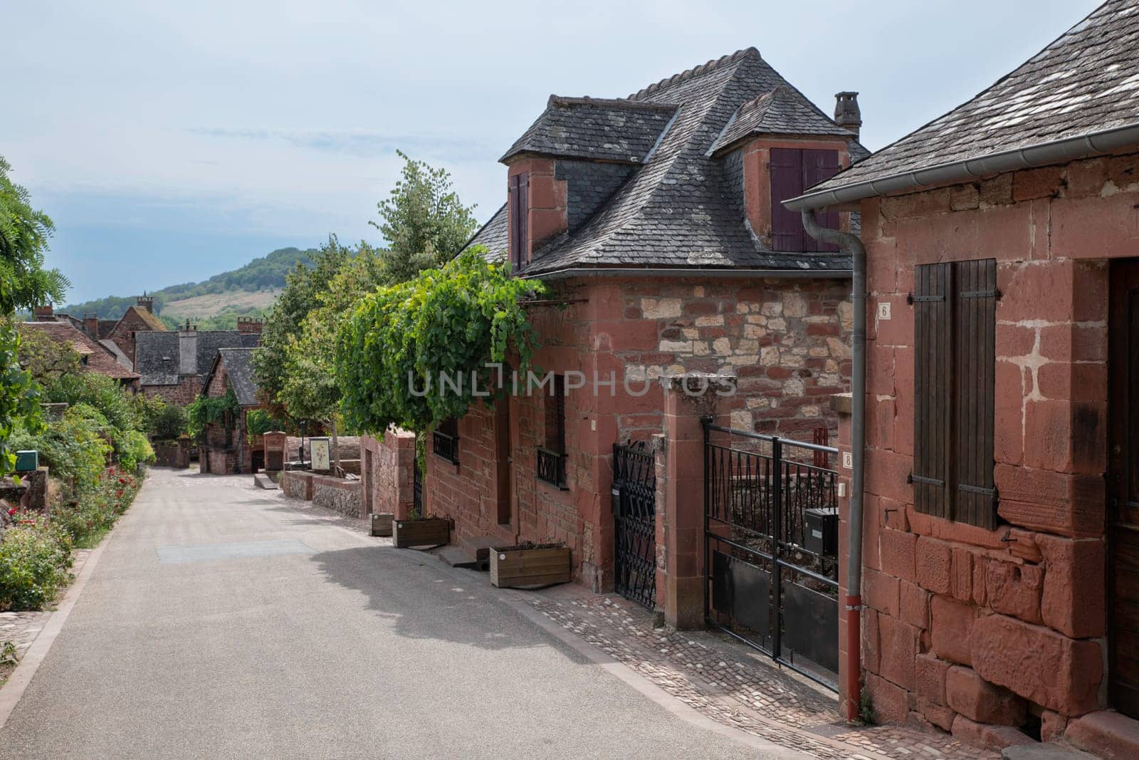 The red village Collonges la rouge in france by compuinfoto