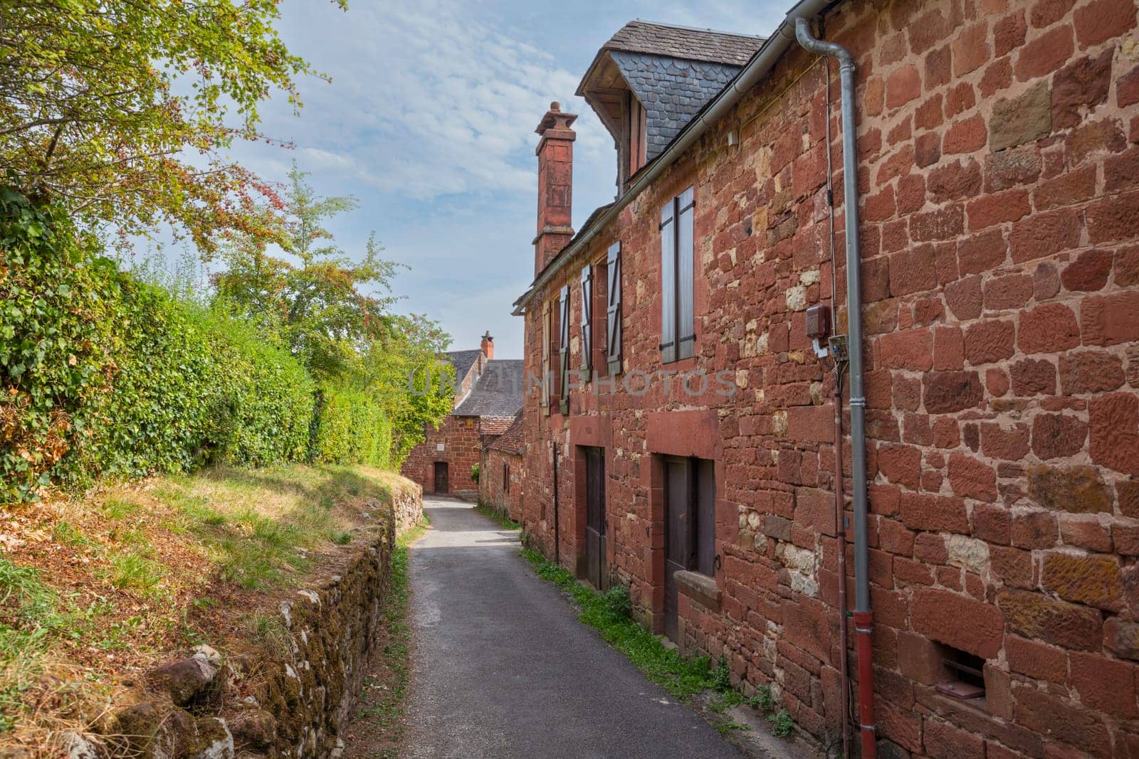 Collonges la Rouge, distinctive red brick houses and towers of the medieval Old Town, France. it is the first member of the Plus Beaux Villages de France nomination most beautiful villages of France by compuinfoto
