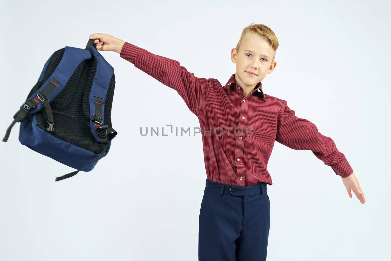 A schoolboy holds a schoolbag over his head. by Sd28DimoN_1976