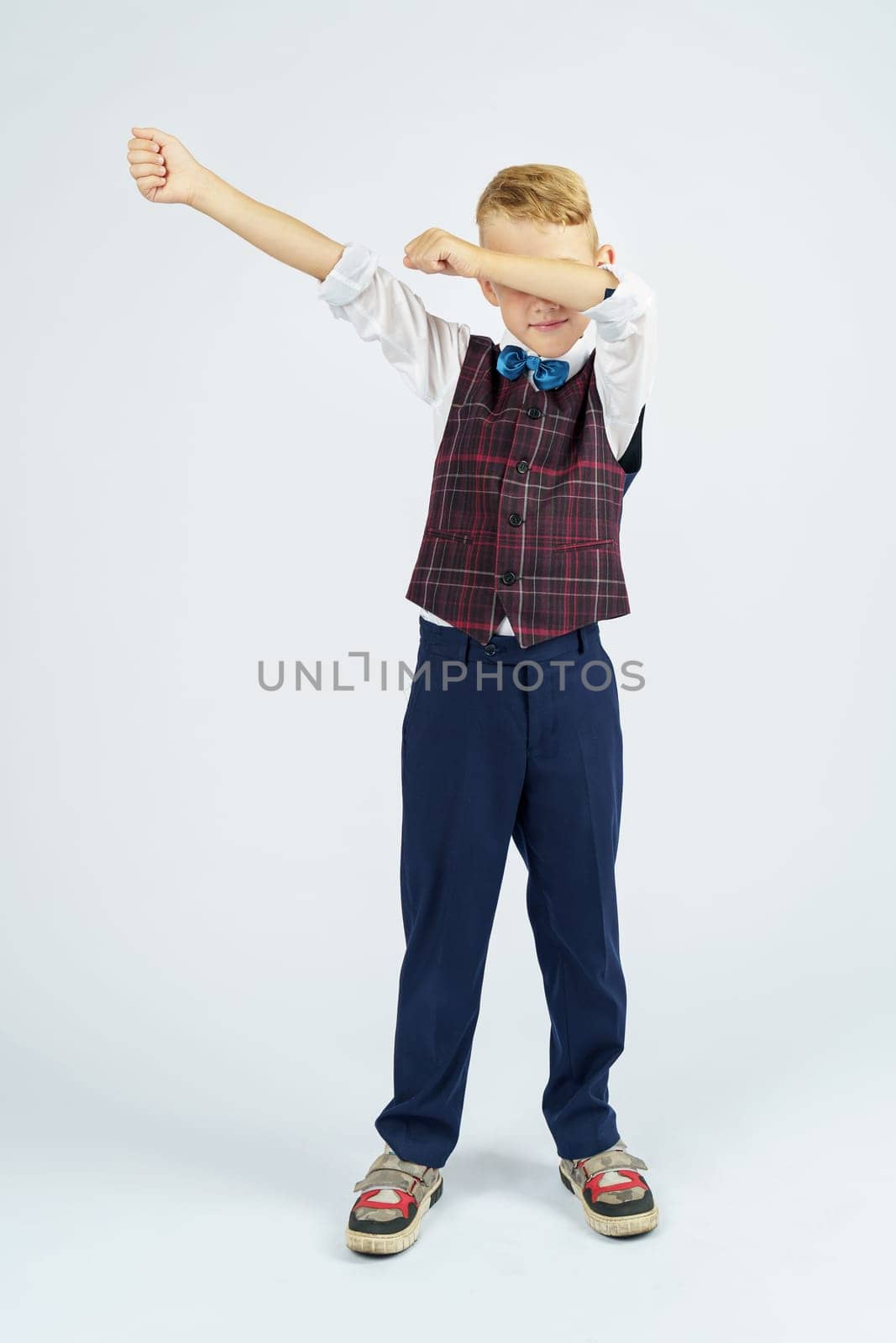 A portrait of a schoolboy who raised his hands up and makes a gesture with his hands. Isolated background. by Sd28DimoN_1976