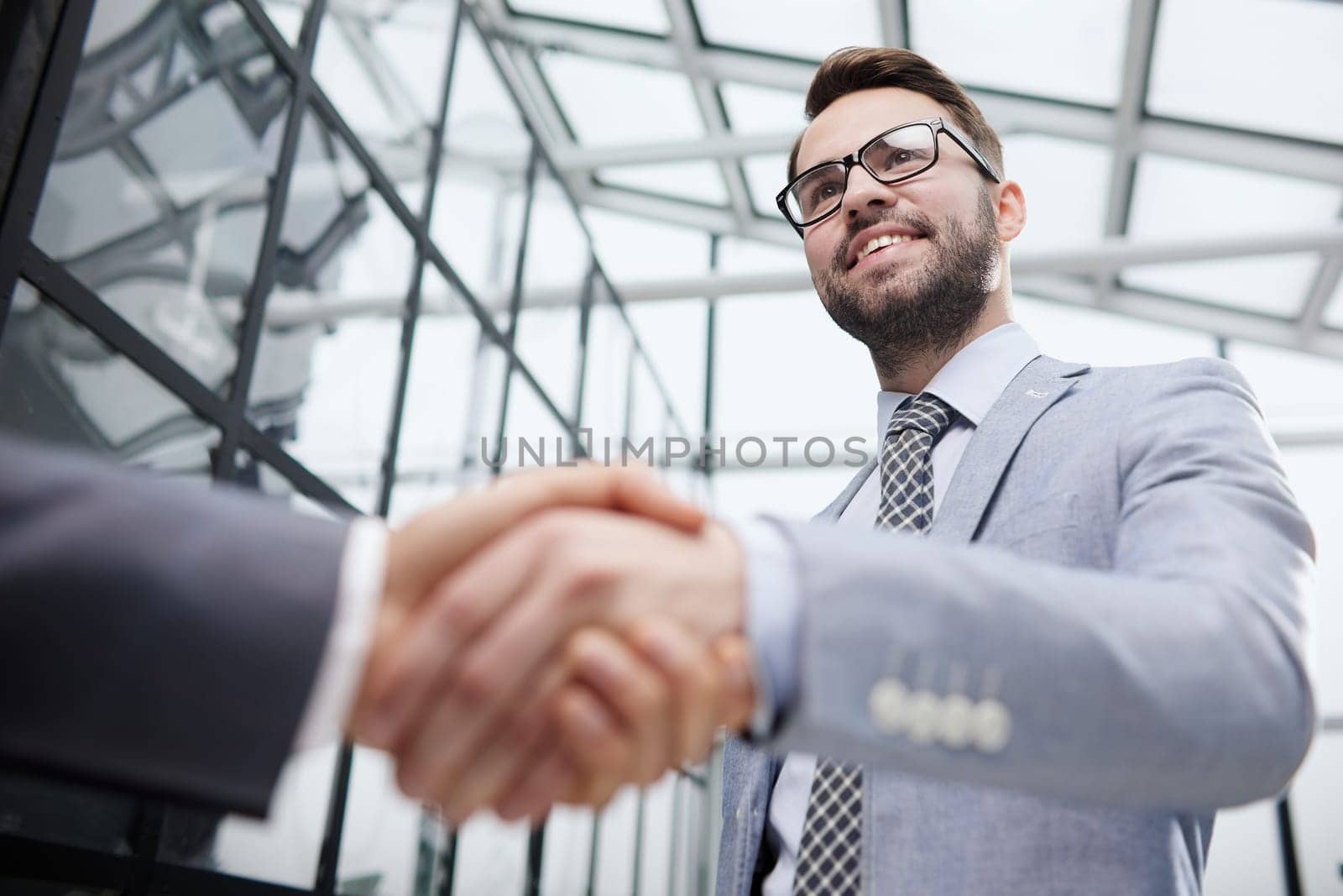 Business people shaking hands, finishing up meeting