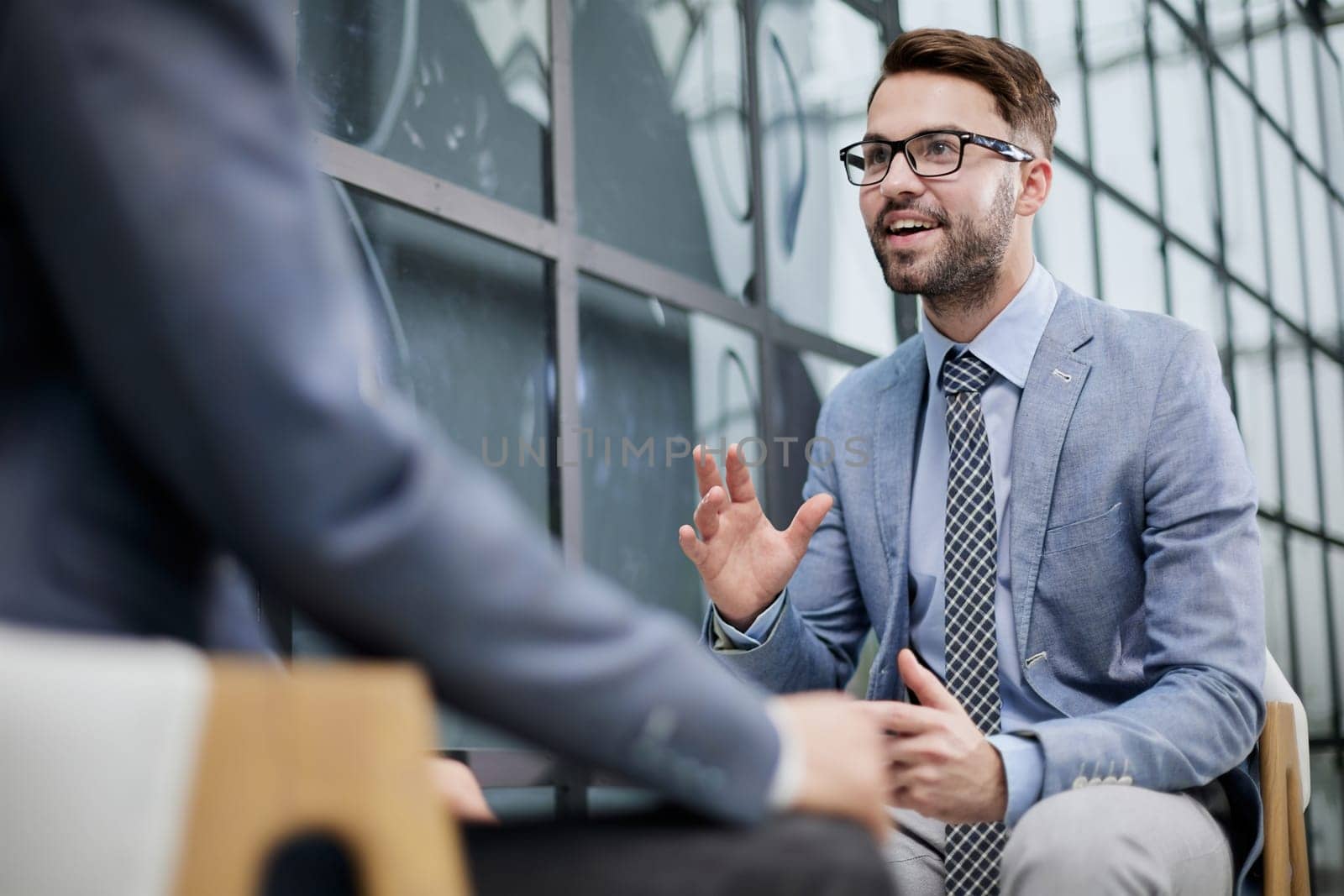 Two diverse business men analysts partners talking, working together