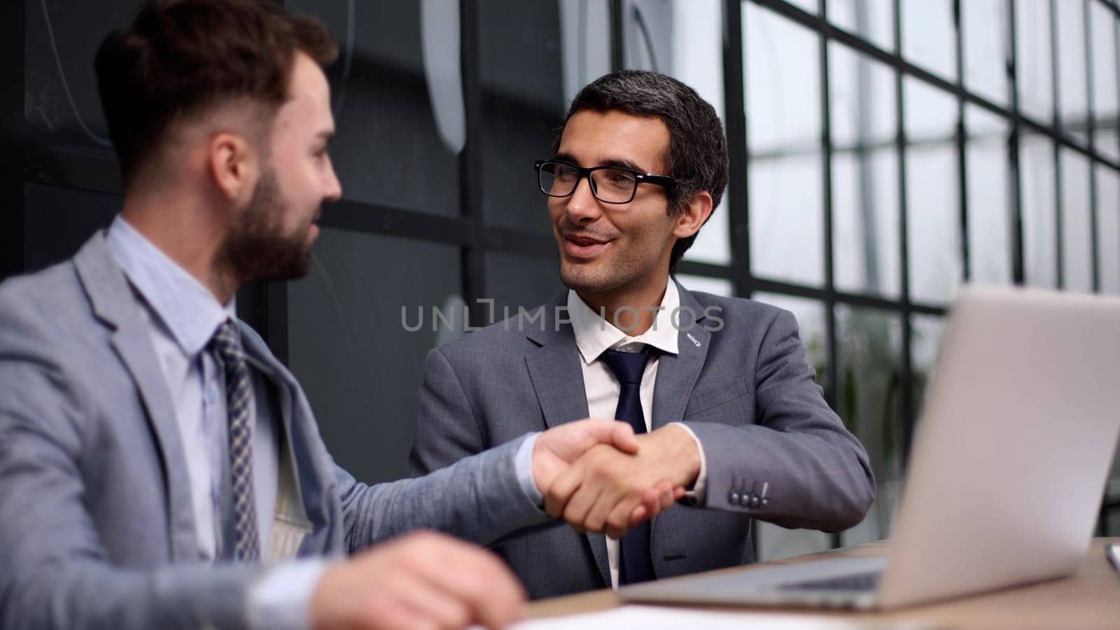 Let me explain. a group of corporate business colleagues having a meeting around the table in the boardroom.