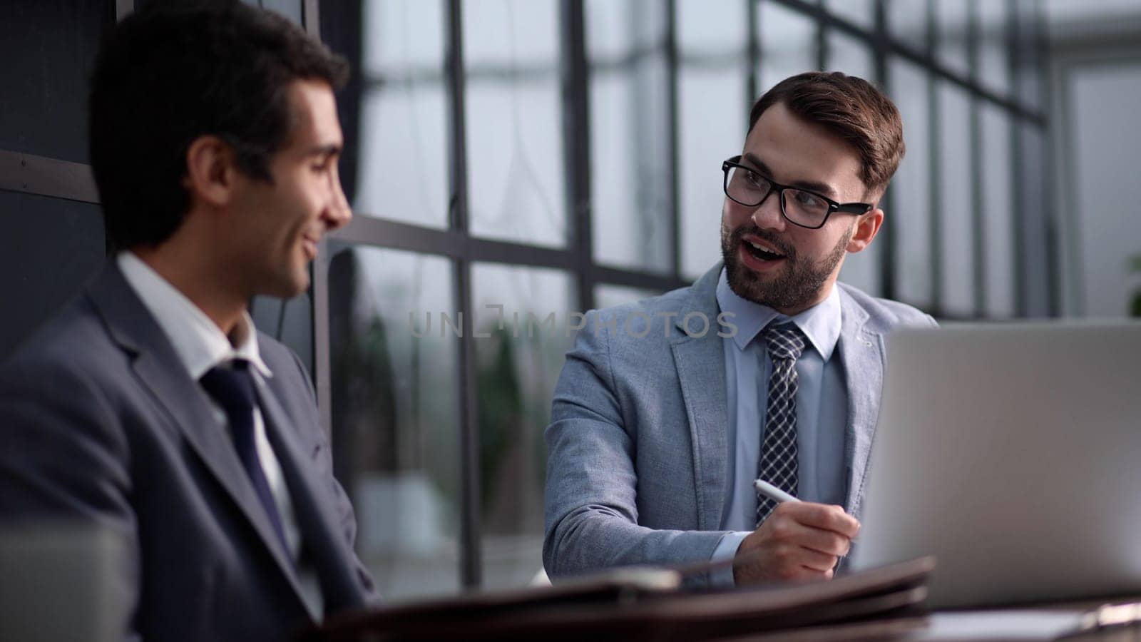 mature man using laptop for calculating reports and summarizing accounts, businessman at work