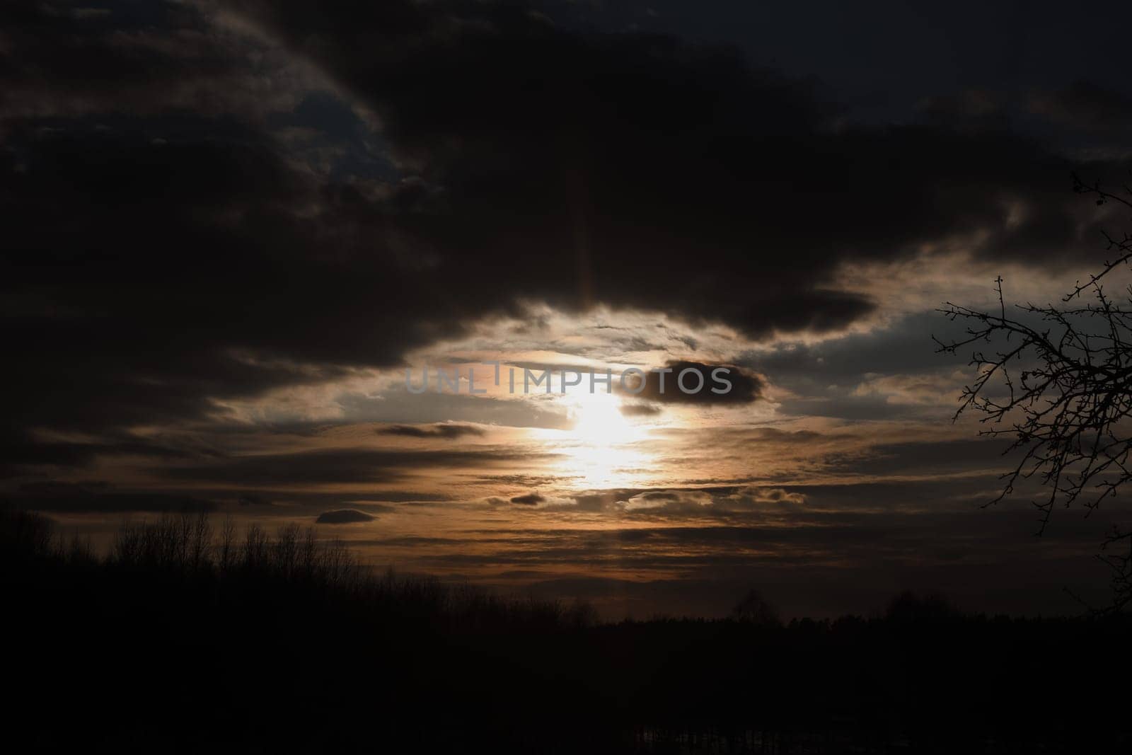 Natural sunset or sunrise. Bright dramatic Sky. Countryside Landscape under Scenic Colorful Sky at Sunset. Sun over skyline, Horizon