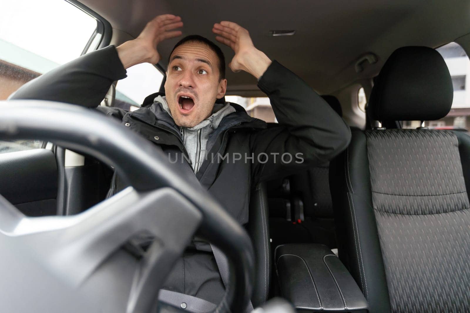 Rude man driving his car and arguing a lot. High quality photo