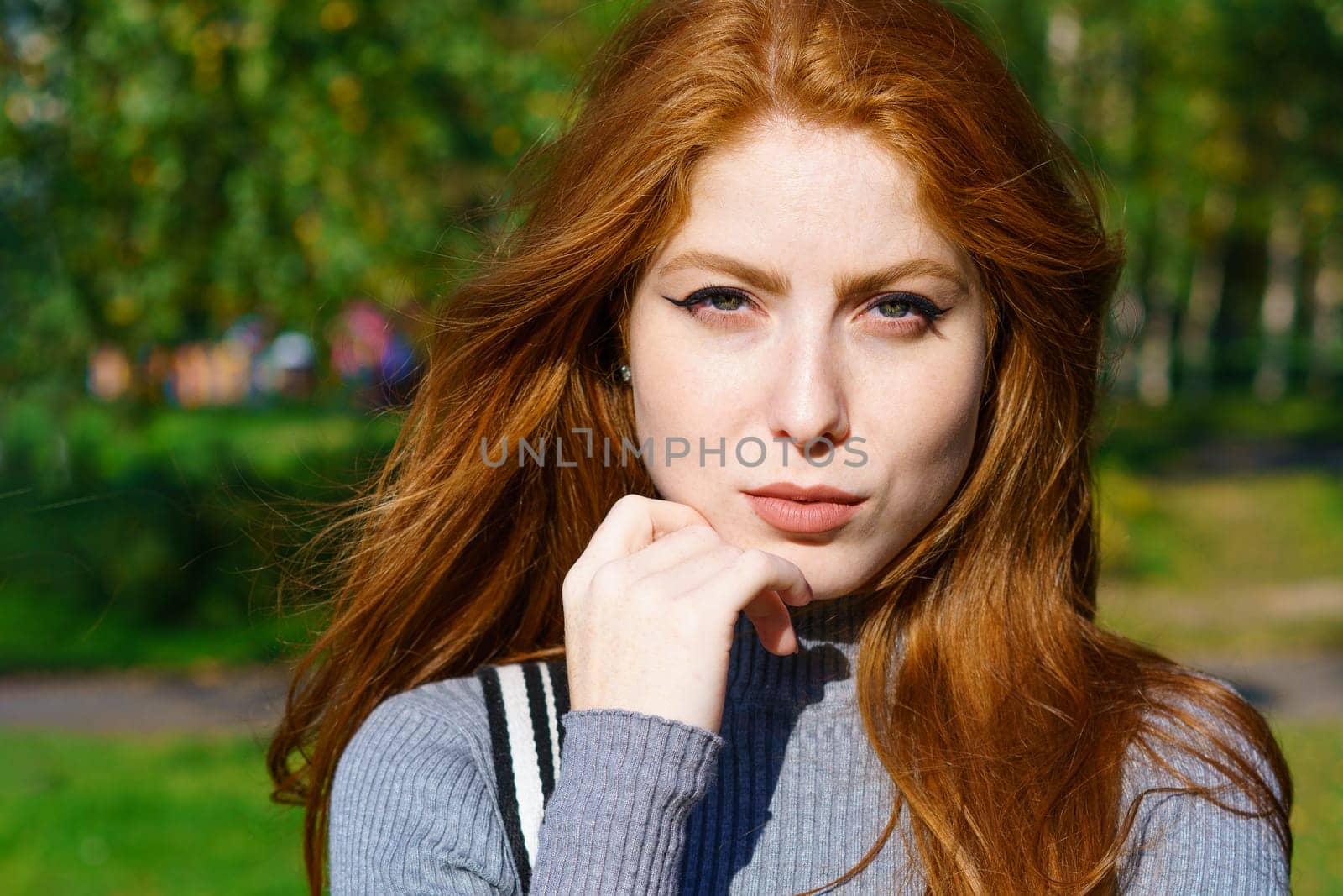 Closeup portrait of a red-haired woman with makeup by EkaterinaPereslavtseva