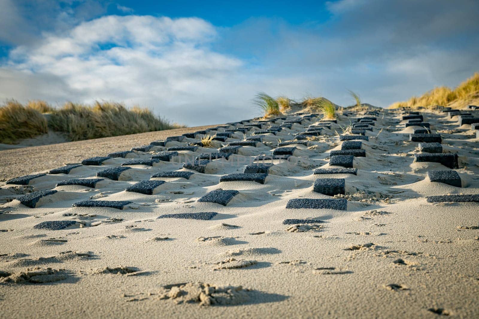 square stone blocks to protect the coast from the sea by compuinfoto