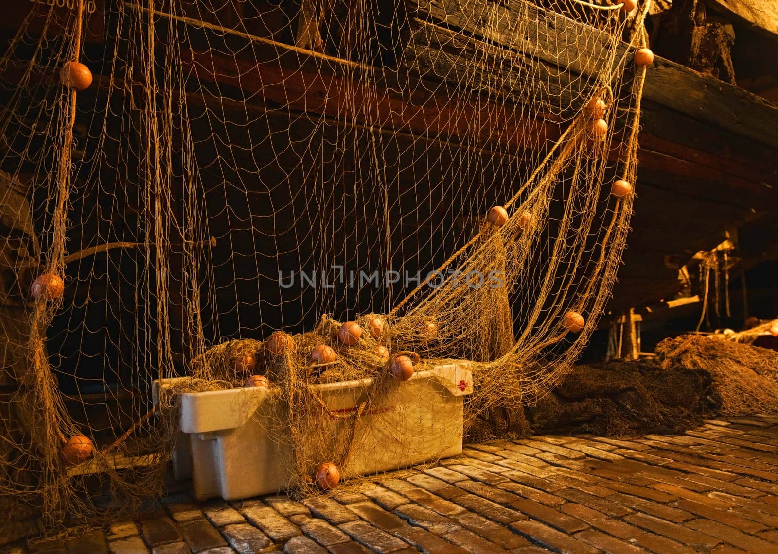 fishing nets with floats for a wooden ship by compuinfoto