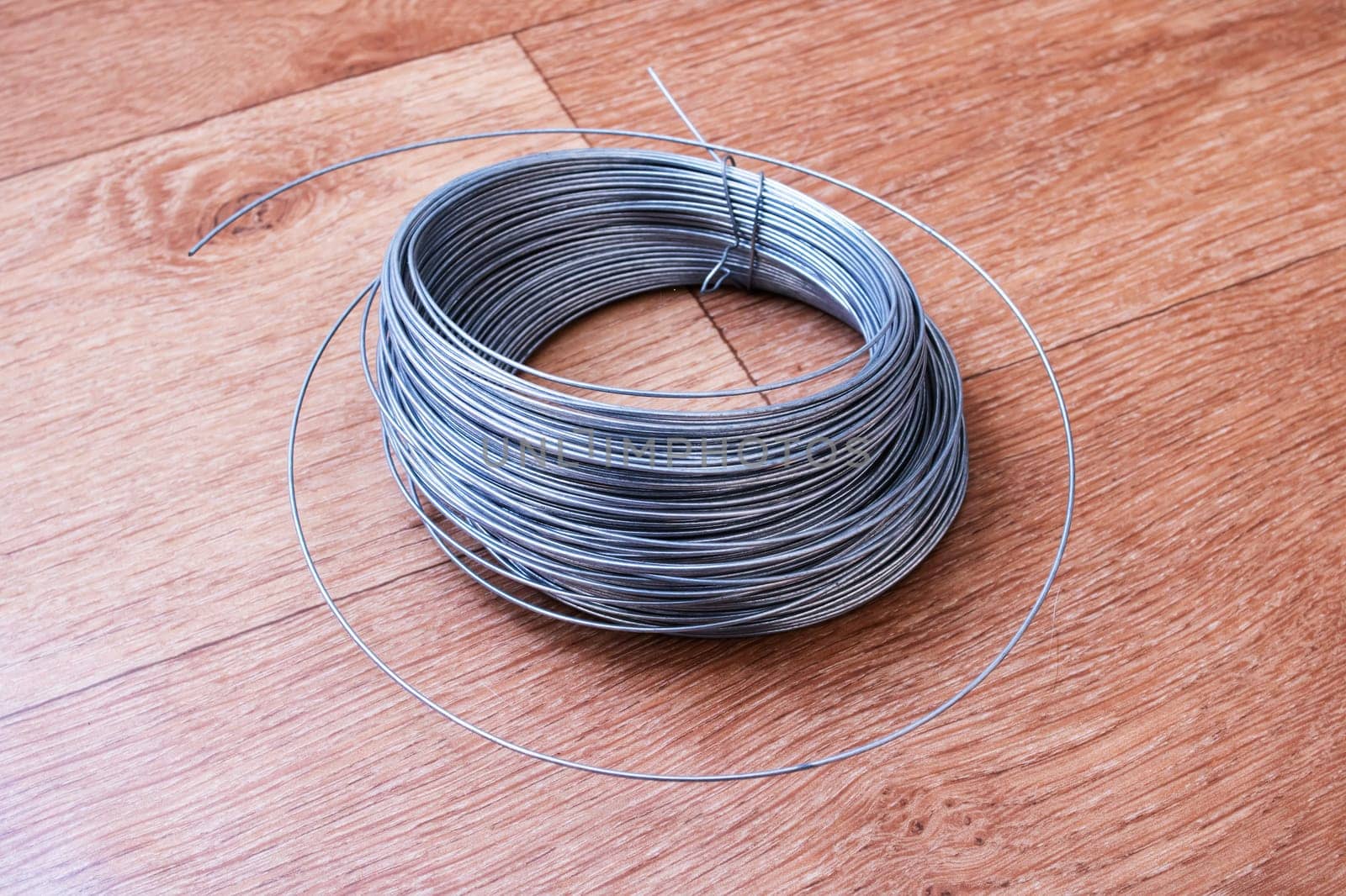 Large coil of wire on the table close up