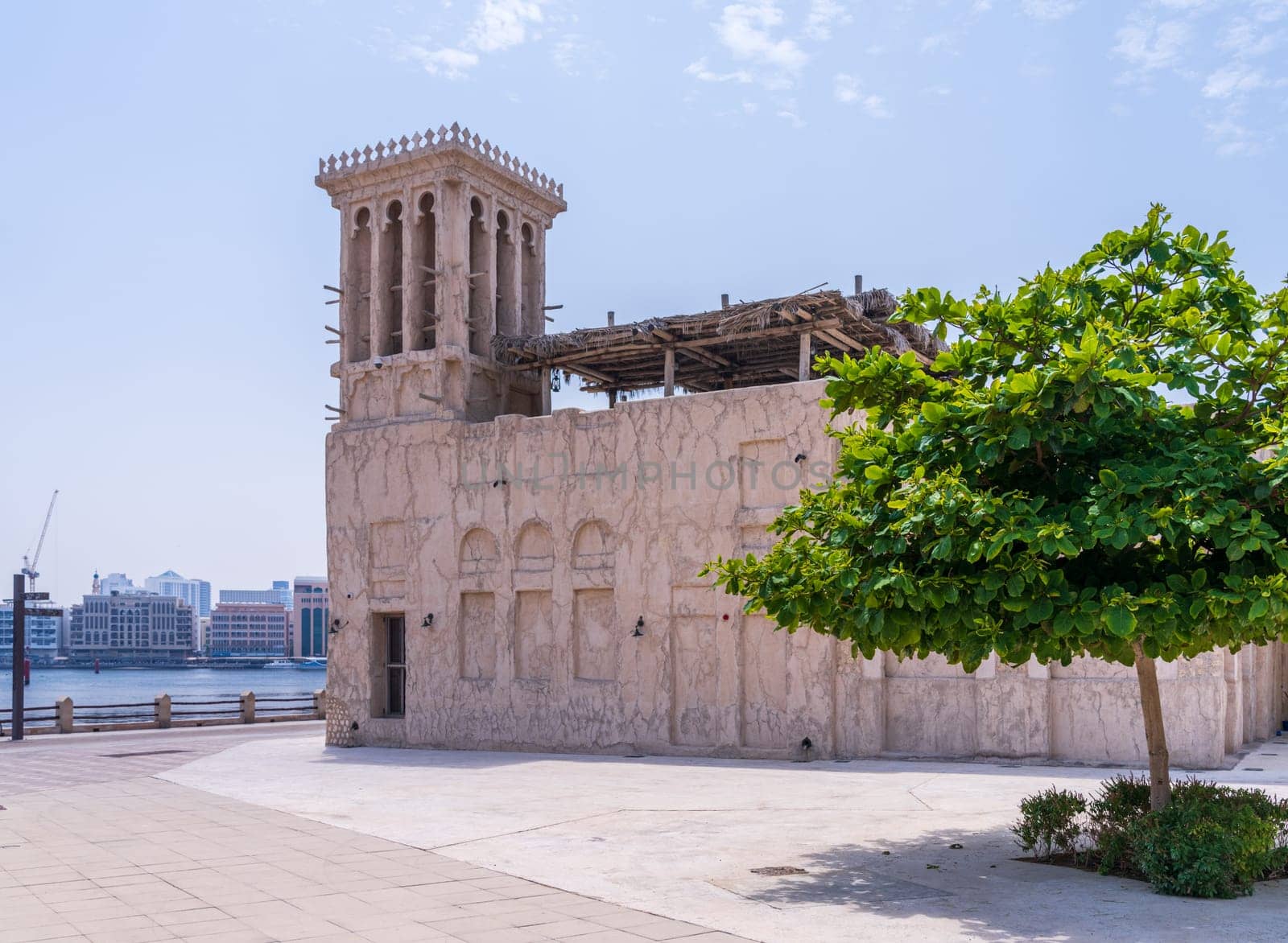 Wide promenade by a traditional house along the Creek in the Al Shindagha district in Bur Dubai